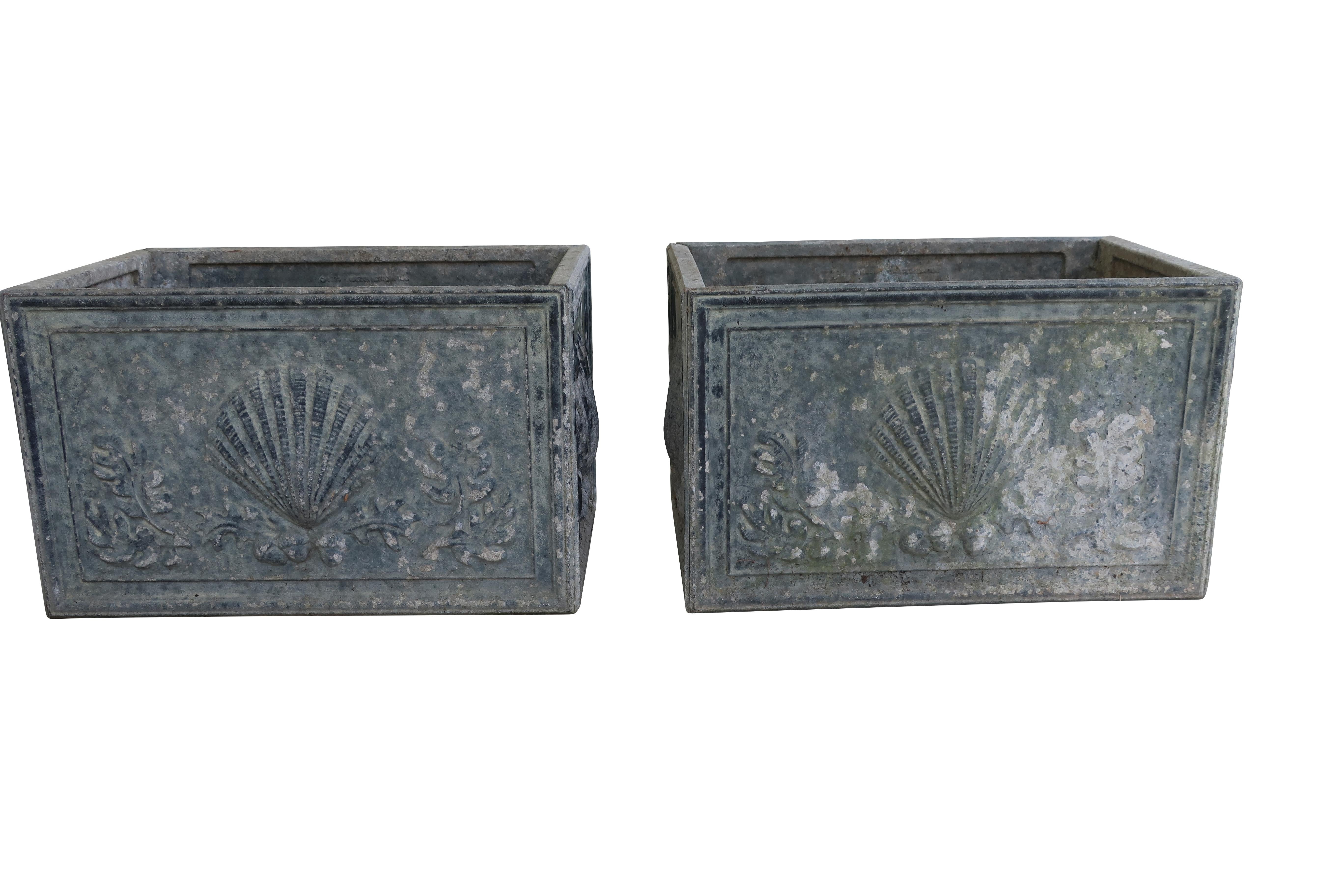 Pair of English lead planters with scallop shell motif
rectangular. 10 X 16 X 10 inches 