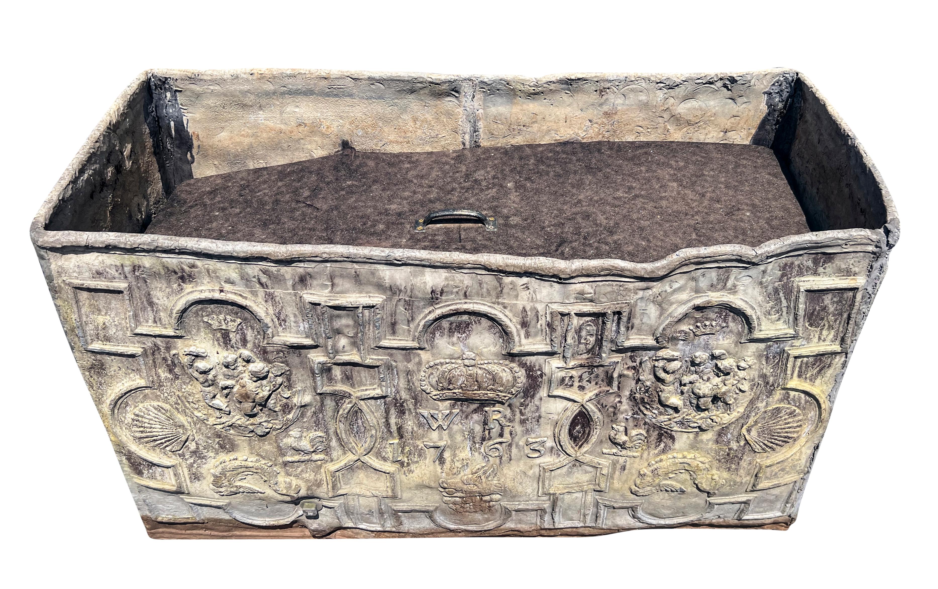 Rectangular with central WR and 1763 with a crown. Featuring crowns , chickens ,  
  shells, boars head , flower vases etc. Cisterns were used to collect rain water from roof gutters on stately country homes in England . Removed from a Hamilton