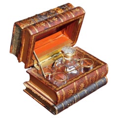 English Leather Book Hinged Decanter Set with Fitted Bottle & Glasses, C 1850