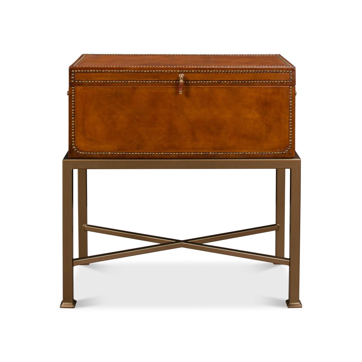 Adorned with brass trim, the leather box exudes an air of nobility and luxury. The brass accents catch the light and draw the eye, adding an extra layer of allure to the piece. The stand, with its clean lines and sturdy construction, provides the