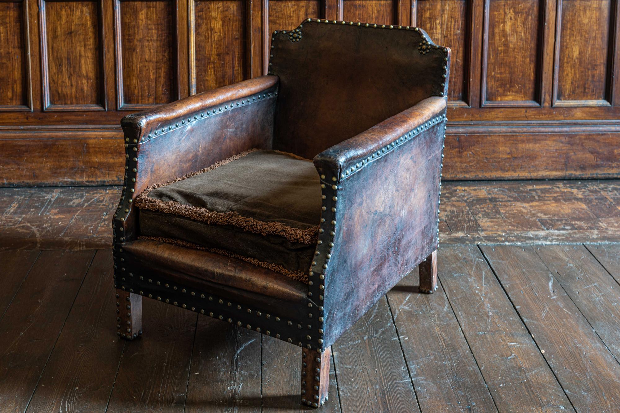 studded leather armchair