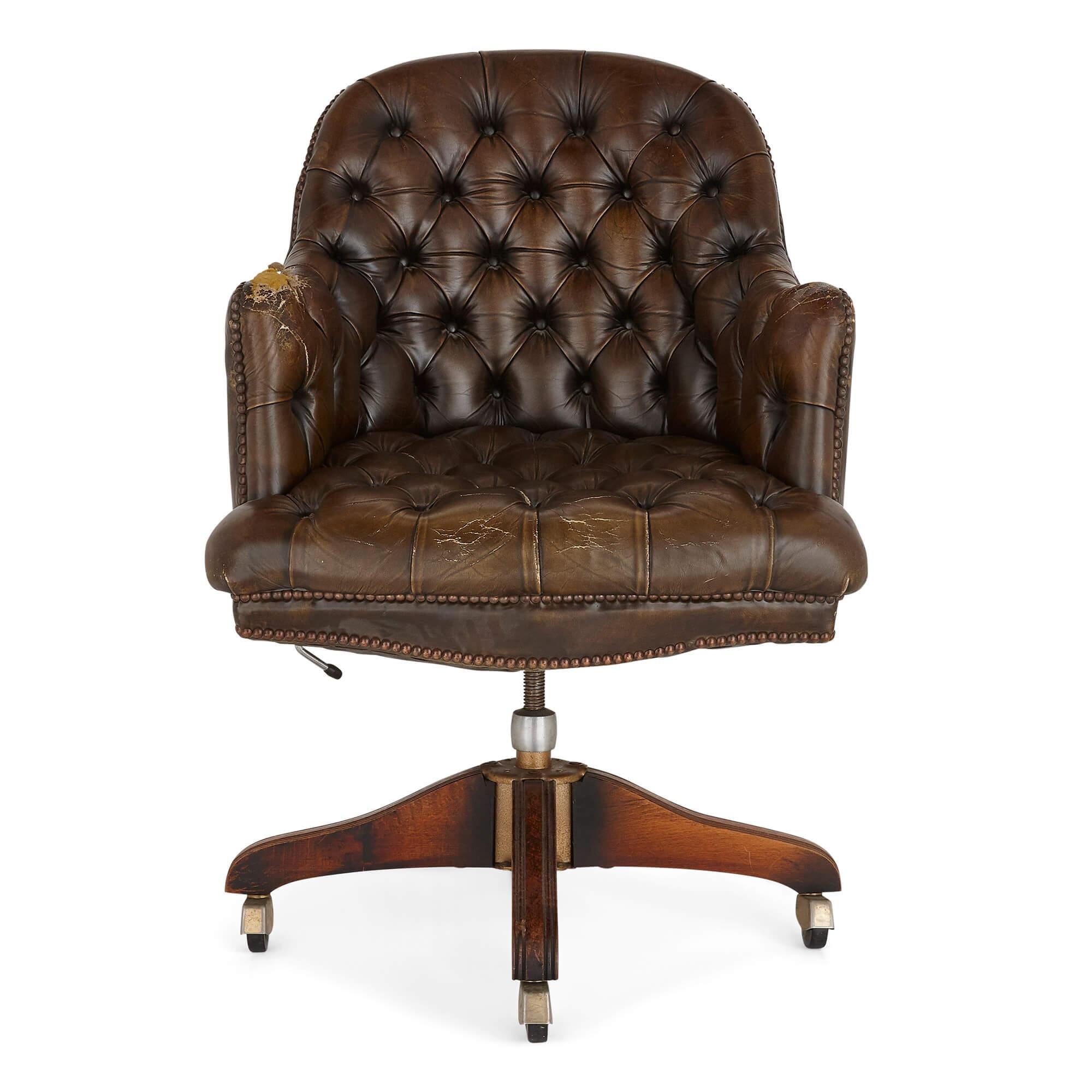 English leather desk chair in the Georgian style
English, 20th century
Measures: Height 138cm, width 45cm, depth 40cm

This fine desk chair is crafted in the Georgian style. The chair features a leather seat and one-piece curved back rest and