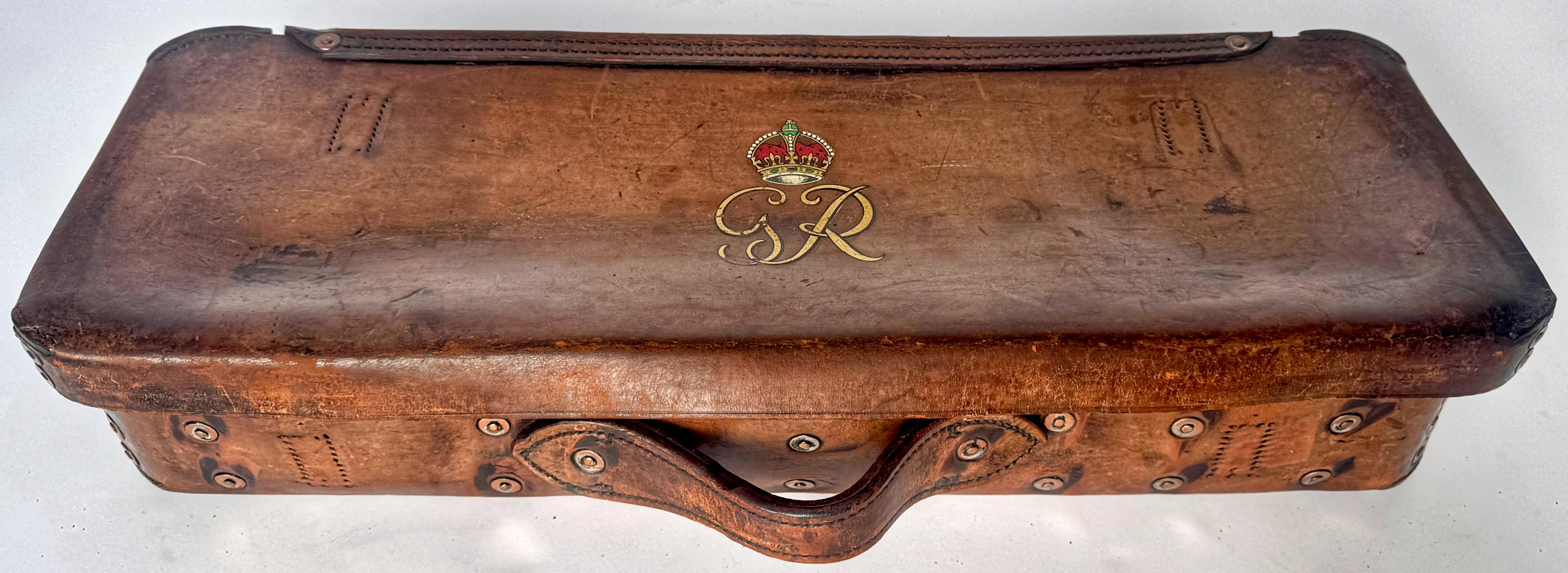 English Leather Sportsman's Case with King George V Cypher 
England, Circa 20th Century 

A distinguished English Leather Sportsman's Case, featuring a regal King George V cypher. Crafted in warm, patinated saddle leather, this rectangular case