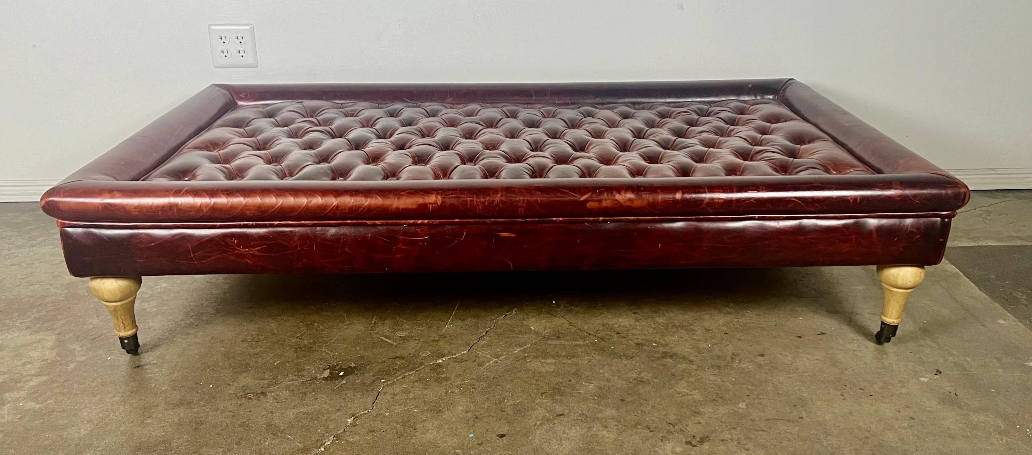 Chesterfield English Leather Tufted Ottoman on Casters For Sale
