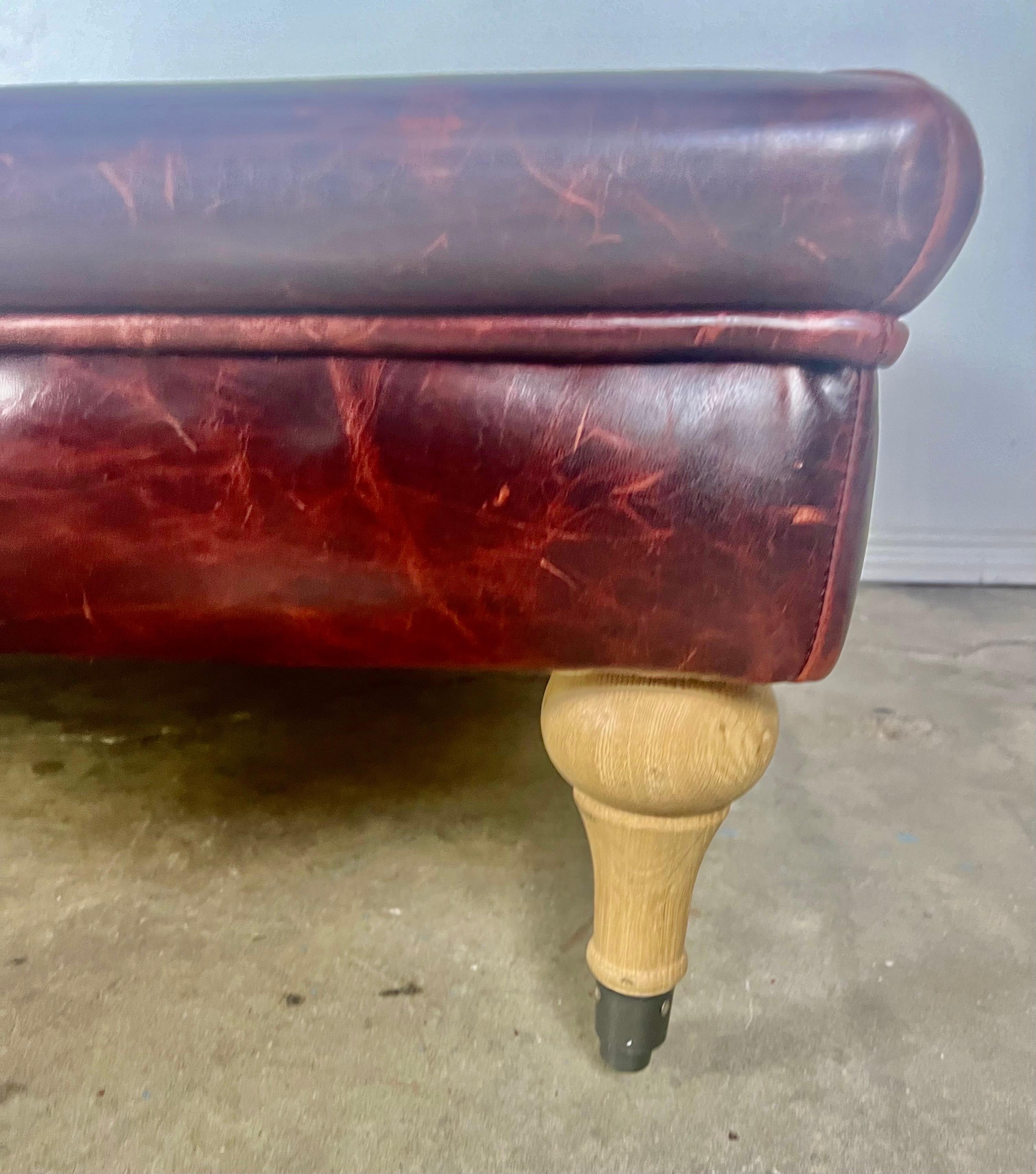 English Leather Tufted Ottoman on Casters For Sale 2