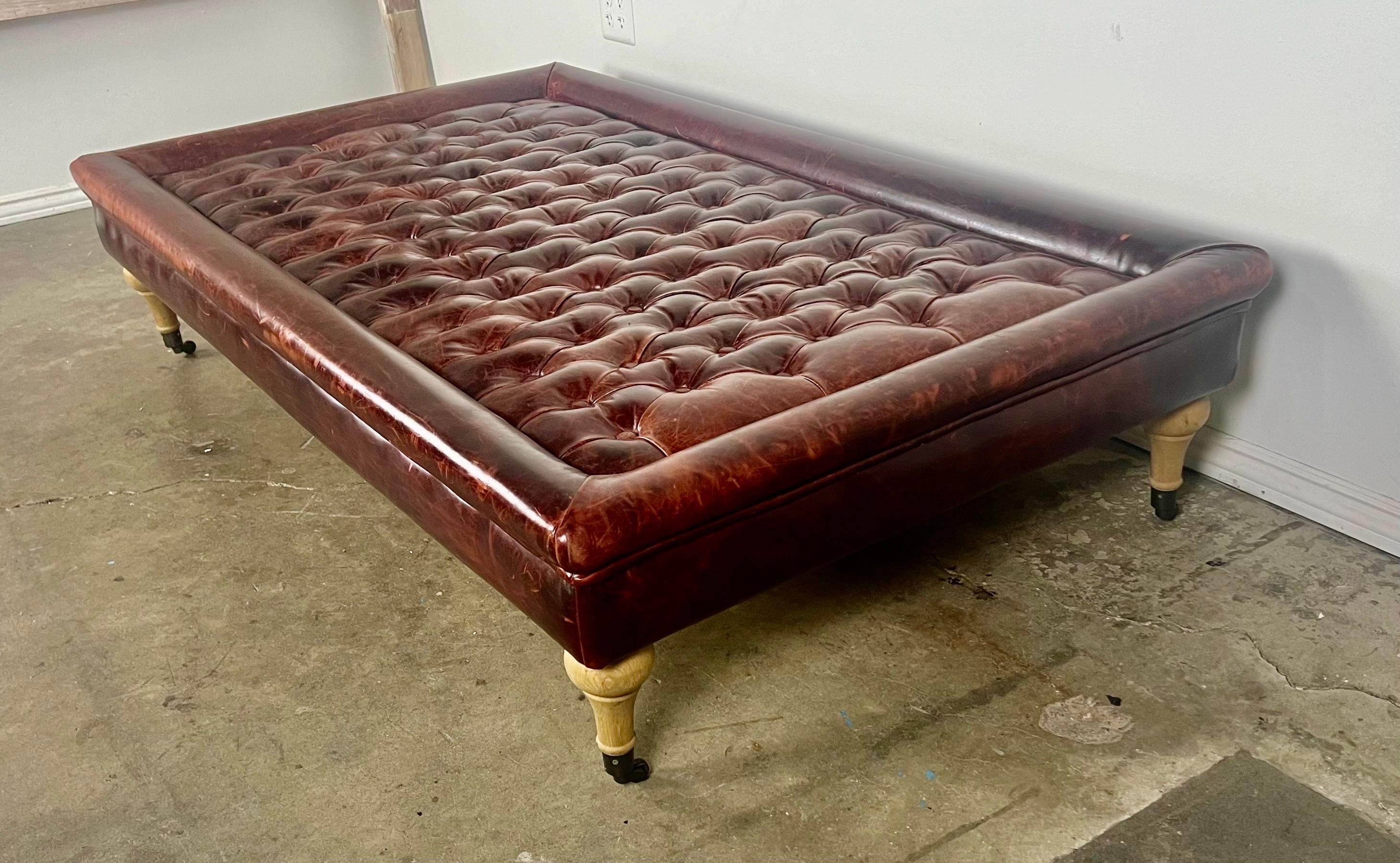 English Leather Tufted Ottoman on Casters For Sale 4