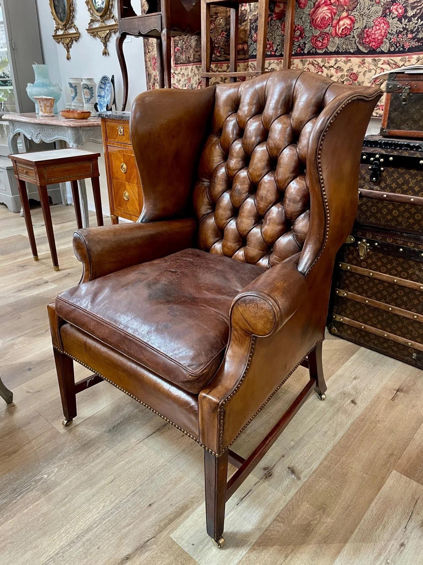 Georgian English leather tufted wingback chair, 19th Century