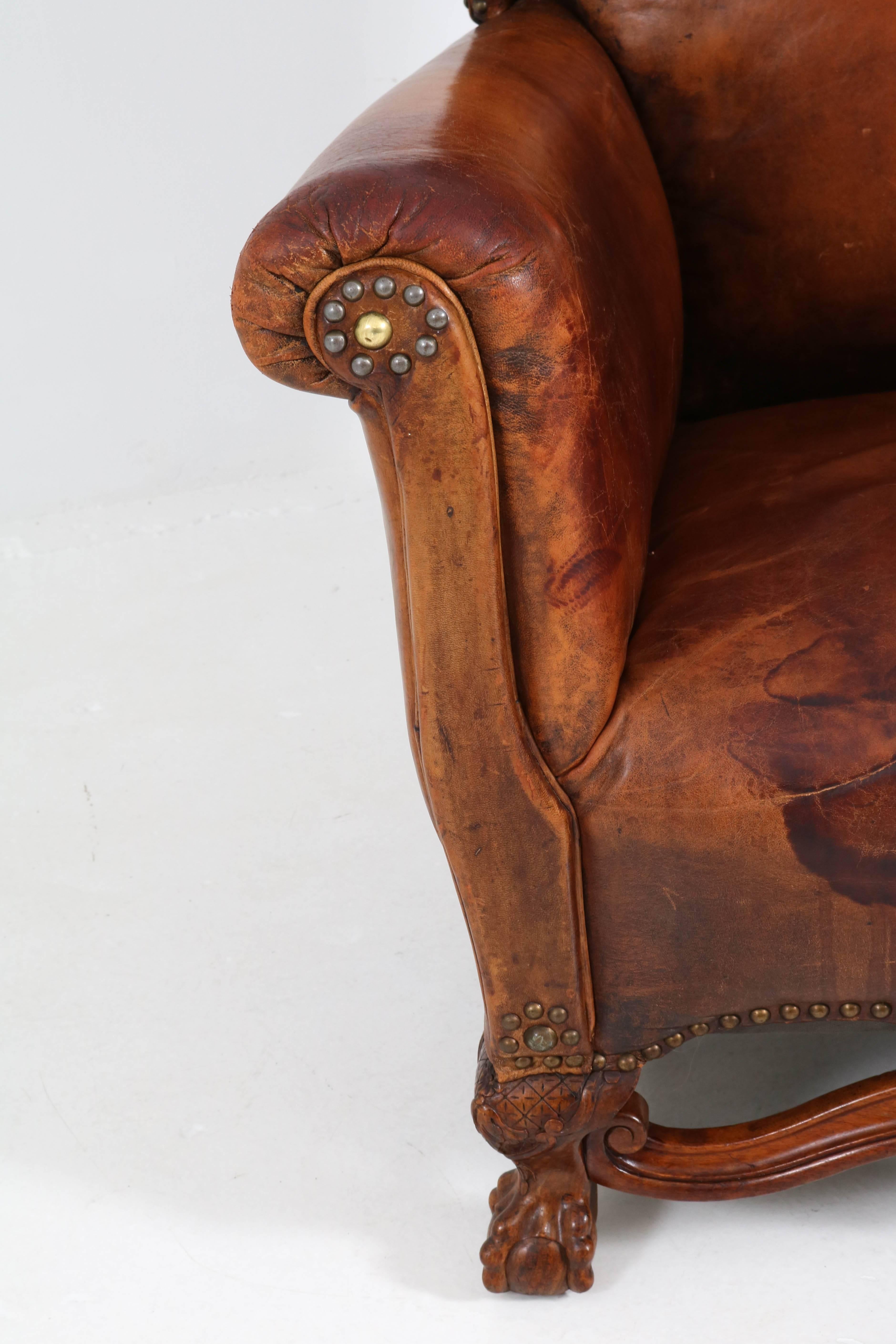 English Leather Wingback Chair with Chippendale Ball Claw Feet, 1930s In Fair Condition In Amsterdam, NL