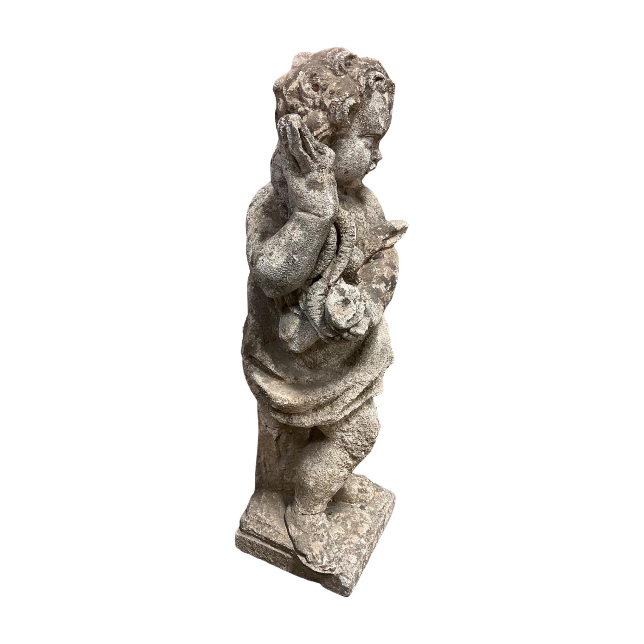 Bring a touch of history to your décor with this English Limestone Cherub Sculpture, crafted from durable limestone in 1890. This intricate carving of a cherub is the perfect accent piece for adding a timeless aesthetic to any home or office.