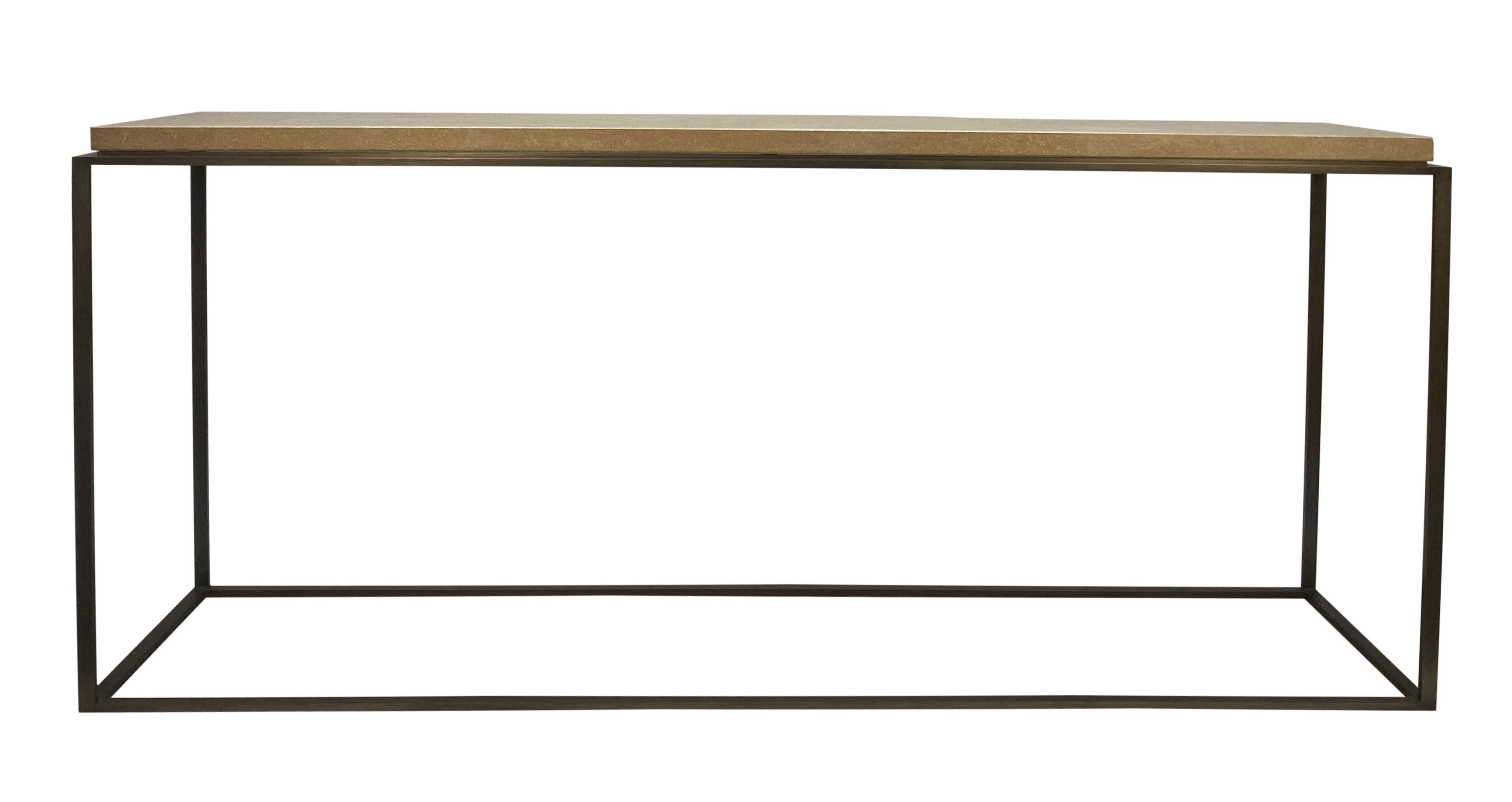 An English console table of linear design, in patinated bronze and polished stone.