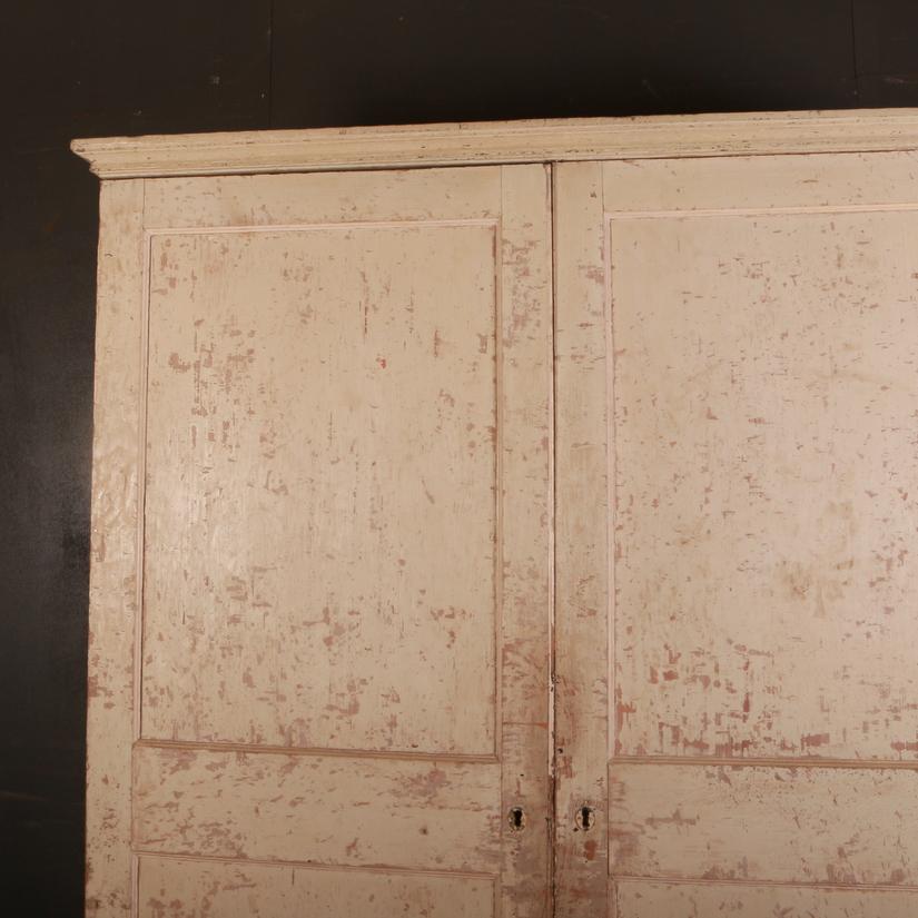 Large 19th century original painted 2-drawer linen cupboard. This can be fitted out with shelves, hanging rails or both, 1800.

Dimensions:
60 inches (152 cms) wide
25 inches (64 cms) deep
83.5 inches (212 cms) high.

  