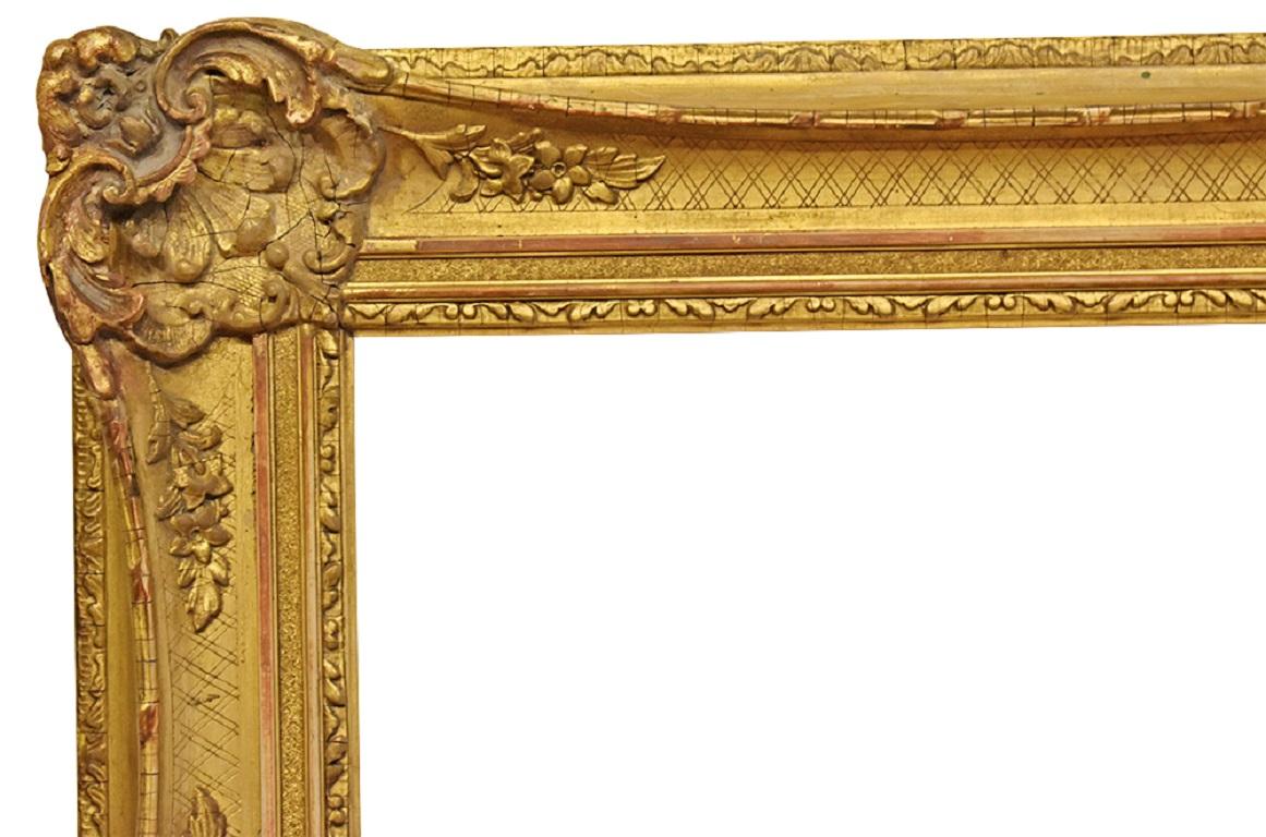 English Louis XV Gold Leaf Frame with 8 shell motif, circa 1890. 

Rabbet Dimensions: 27.5