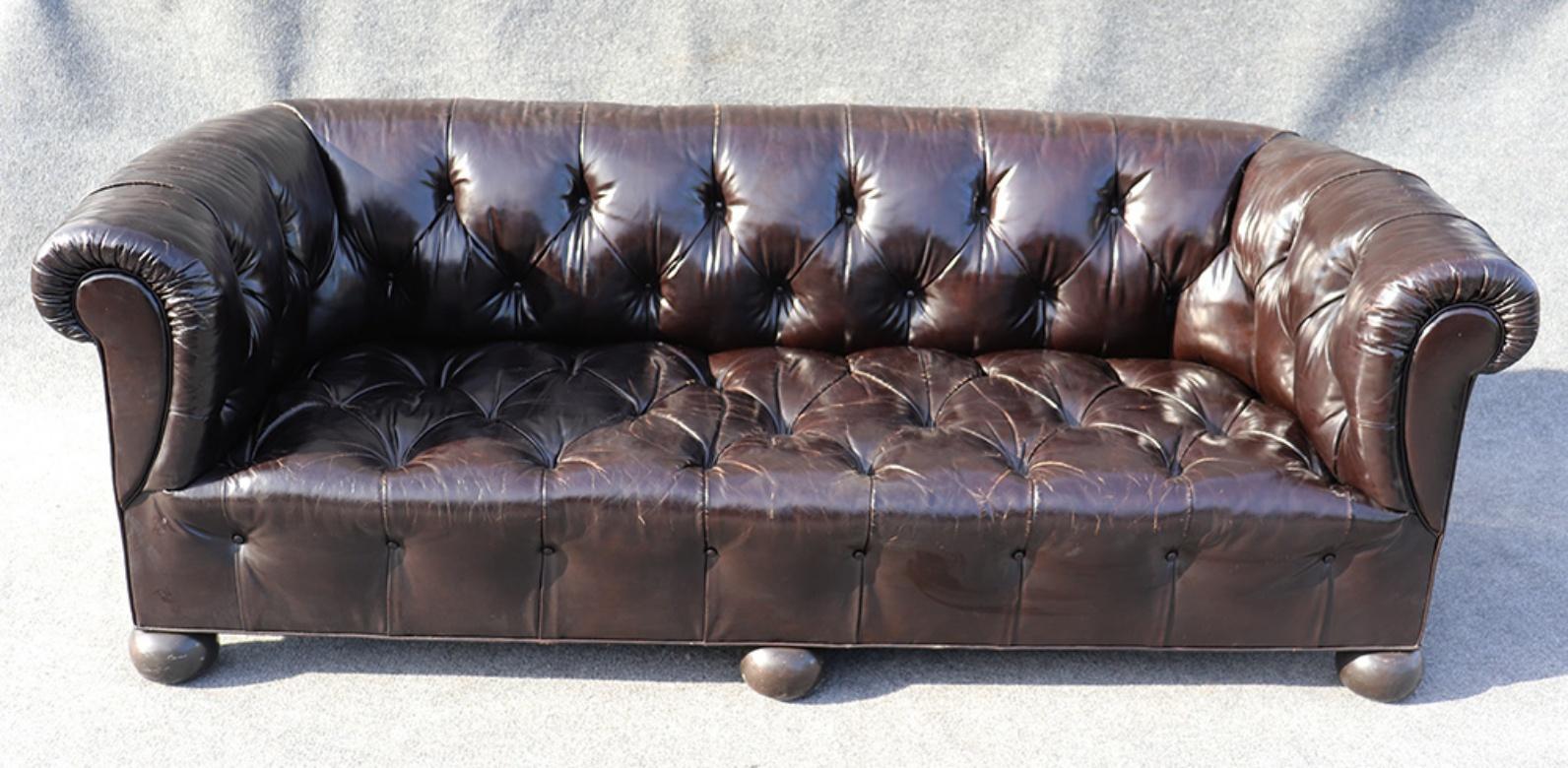 There are many chesterfields online, but few are actually antique! This is an antique English-made chesterfield with the softest leather on bun feet.