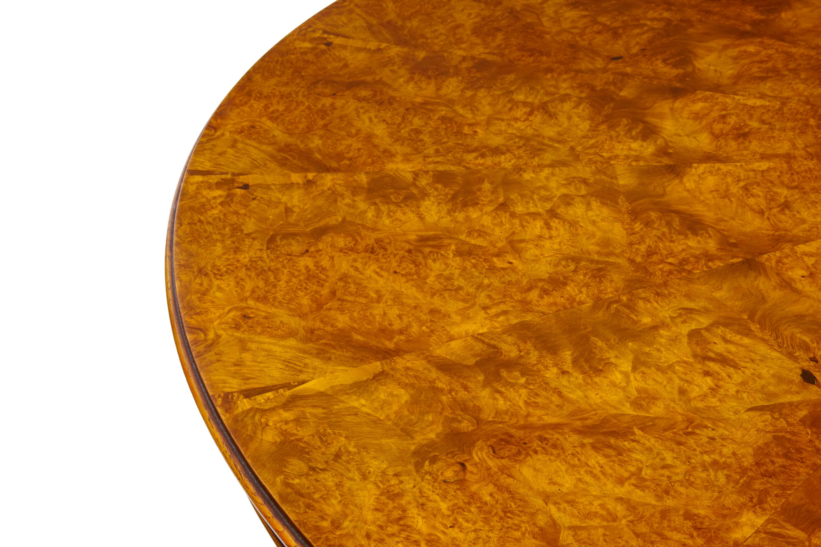 Contemporary English made carved walnut jupe dining table For Sale