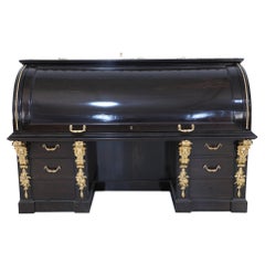 Antique English Mahogany and Gold Accented Roll Top Desk