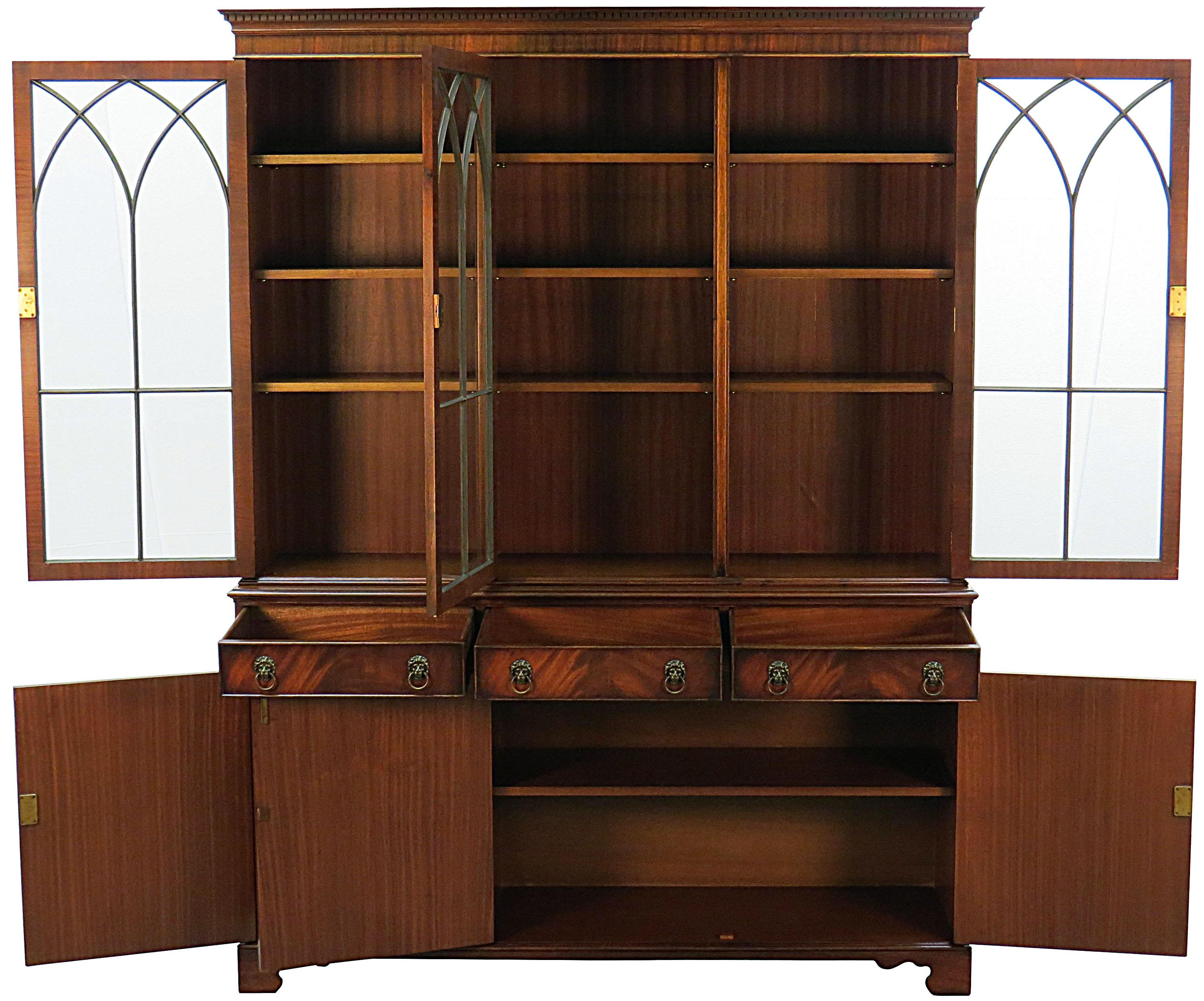 A timeless and elegant look, this Gothic style bookcase uses arches in its construction to create stunning beauty! Crafted in England circa 1960, this piece is sure to add a unique flair to any room or office.

The wood used in its construction is