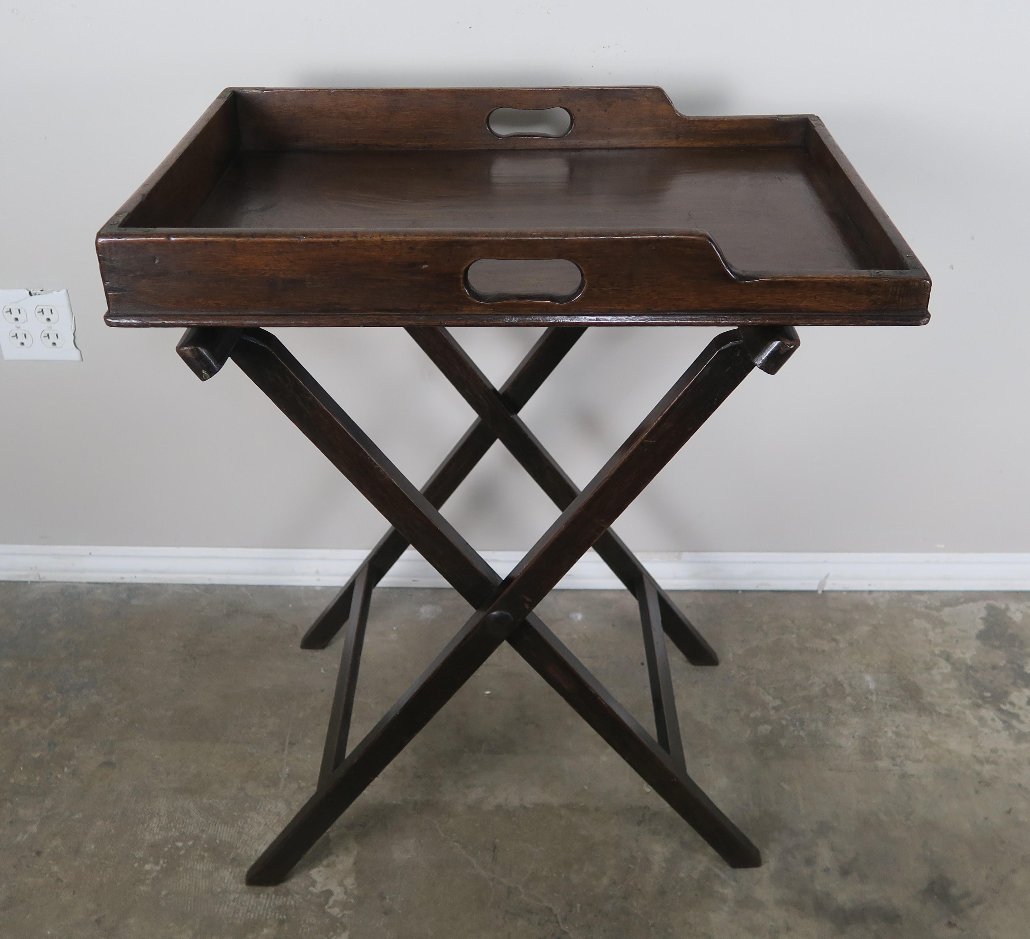 English mahogany two handled butler's tray on a 