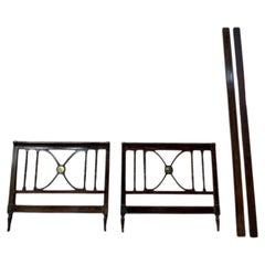 English mahogany child's bed with brass plate