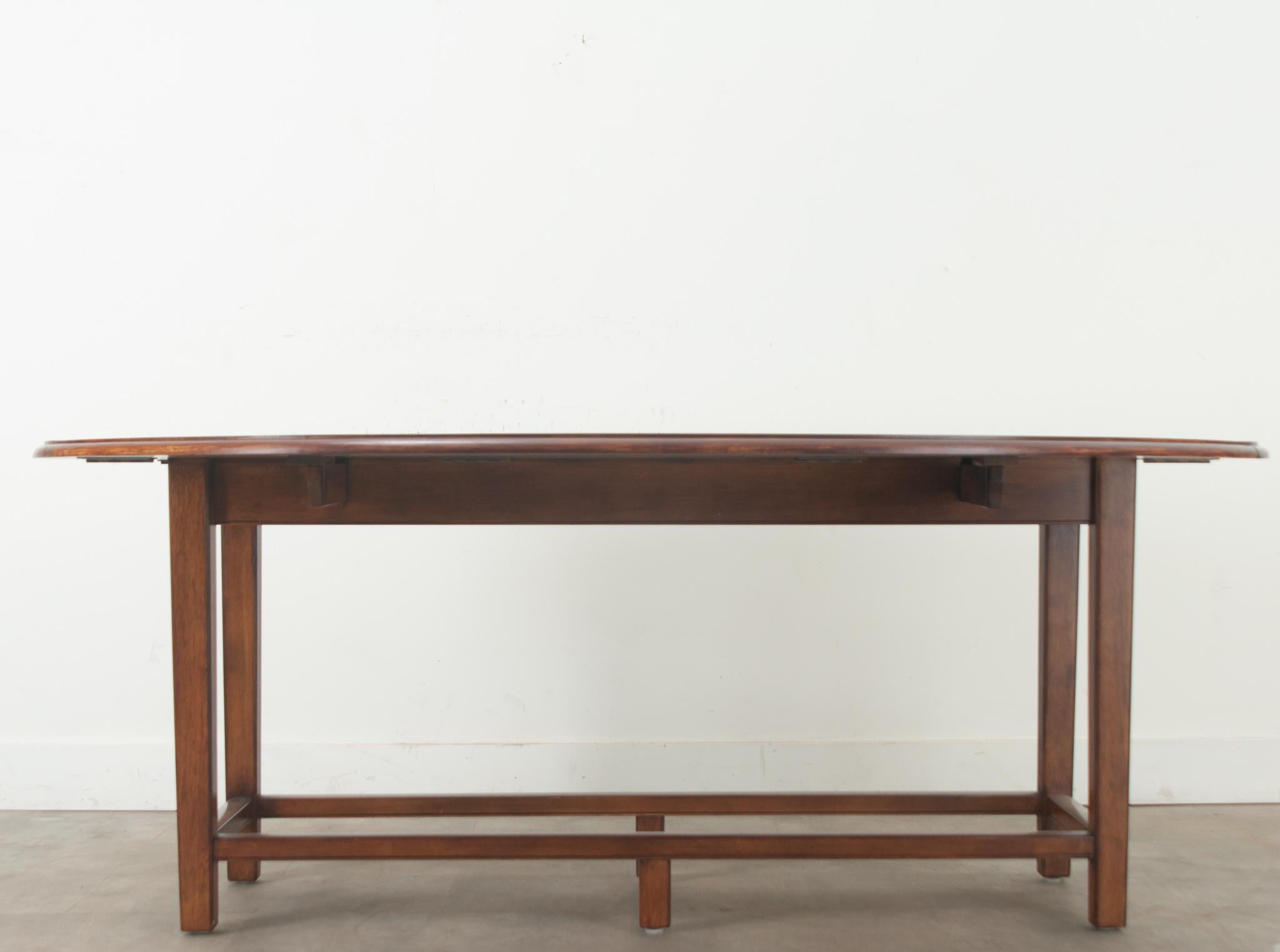 English Mahogany Drop Leaf Oval Dining Table For Sale 2