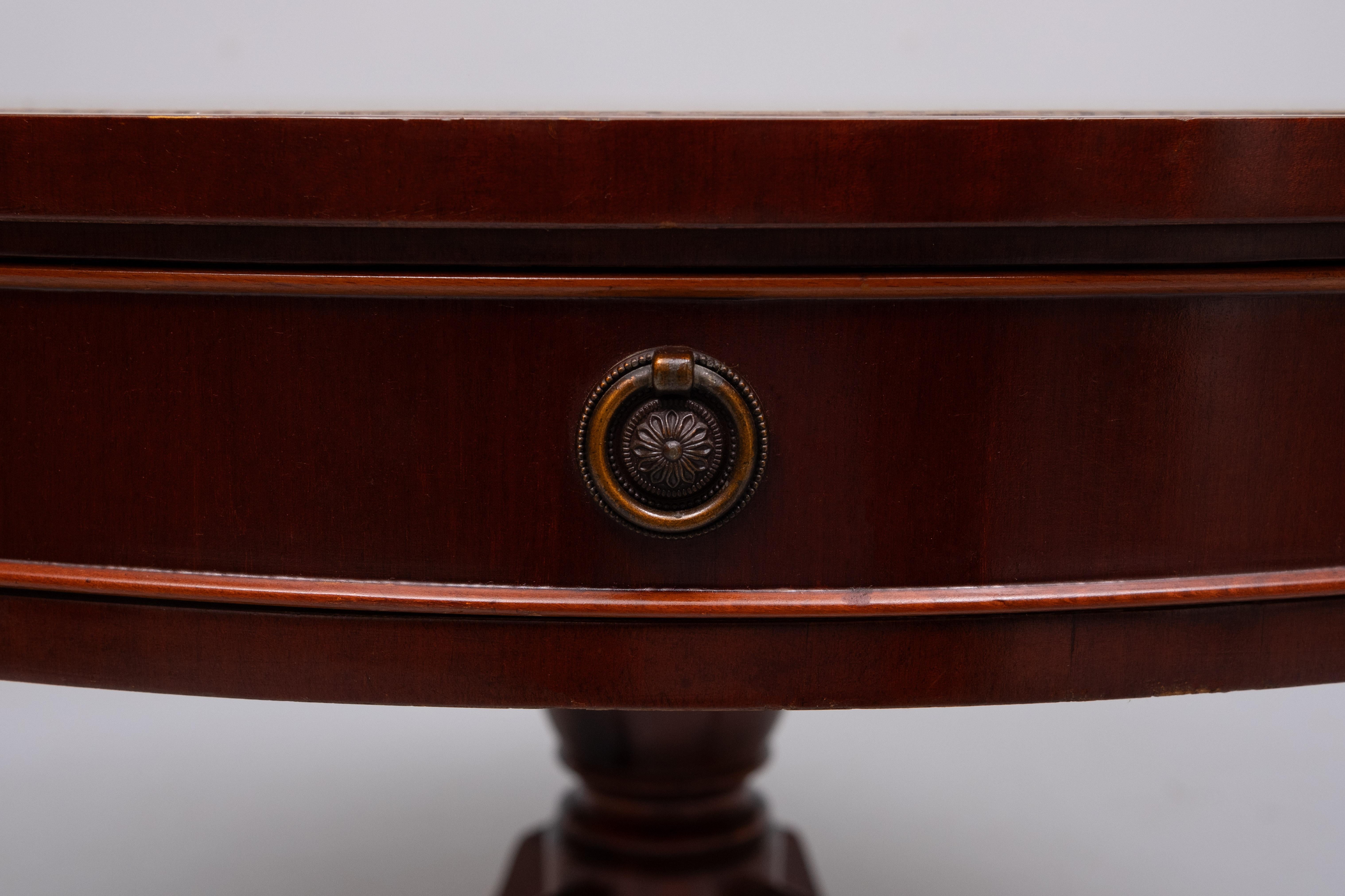 Mid-20th Century English Mahogany Drum Coffee Table Regency style