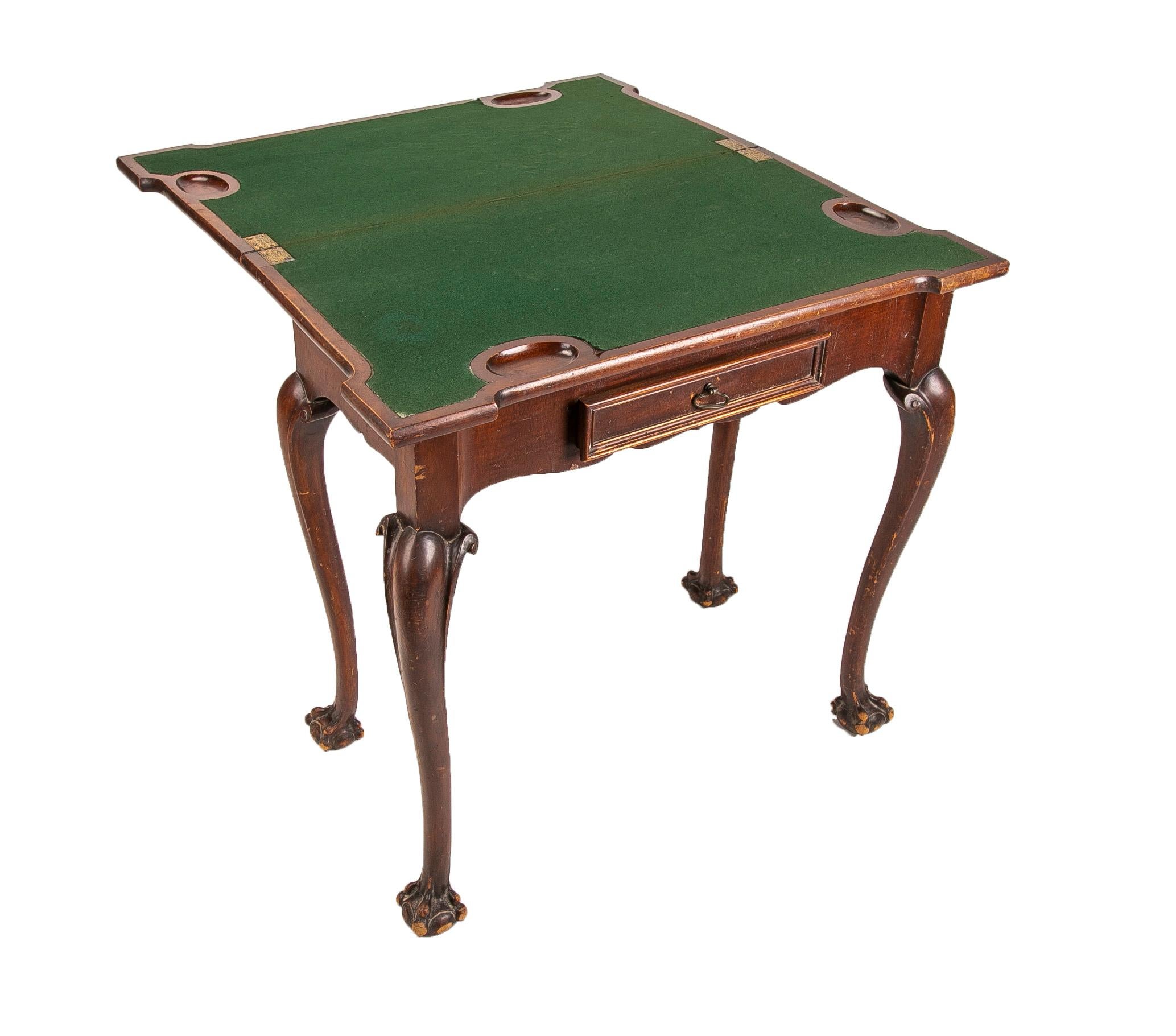 antique game table with claw feet