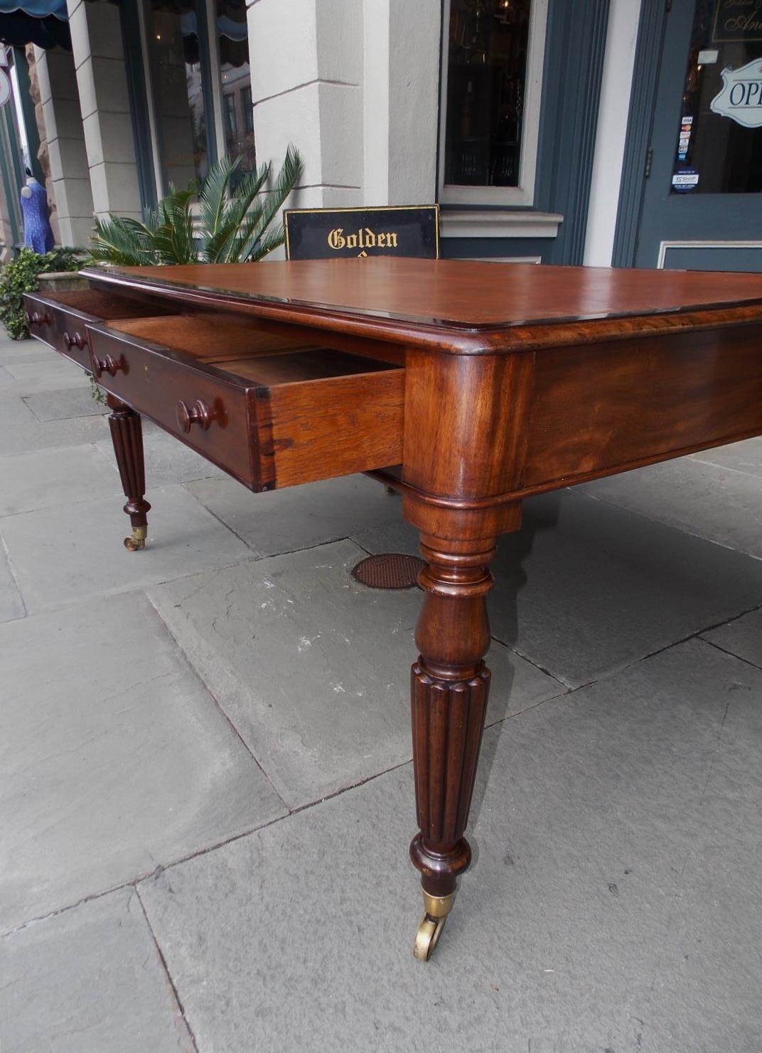 English Mahogany Leather Top Four-Drawer Partners Desk on Casters, Circa 1820 3