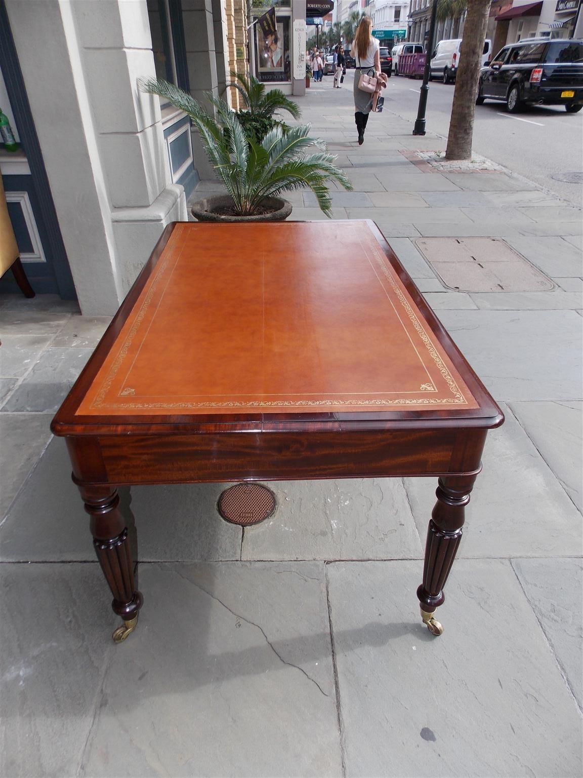 George III English Mahogany Leather Top Four-Drawer Partners Desk on Casters, Circa 1820