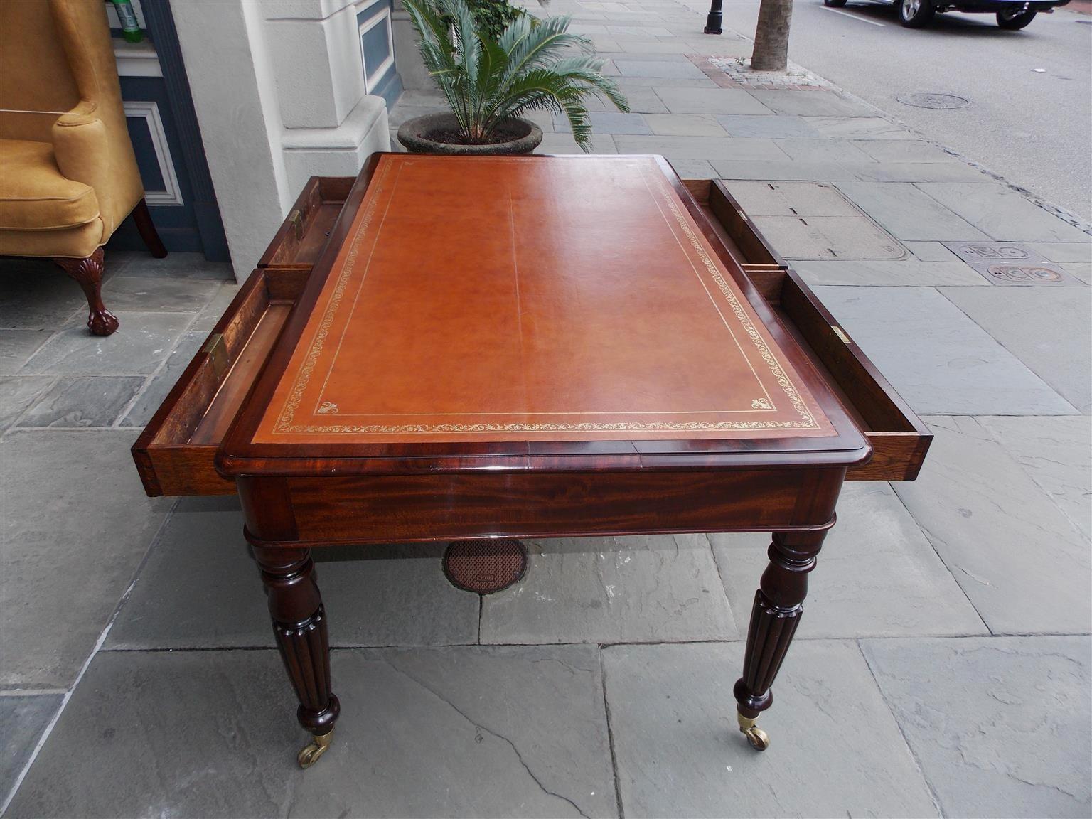 Early 19th Century English Mahogany Leather Top Four-Drawer Partners Desk on Casters, Circa 1820