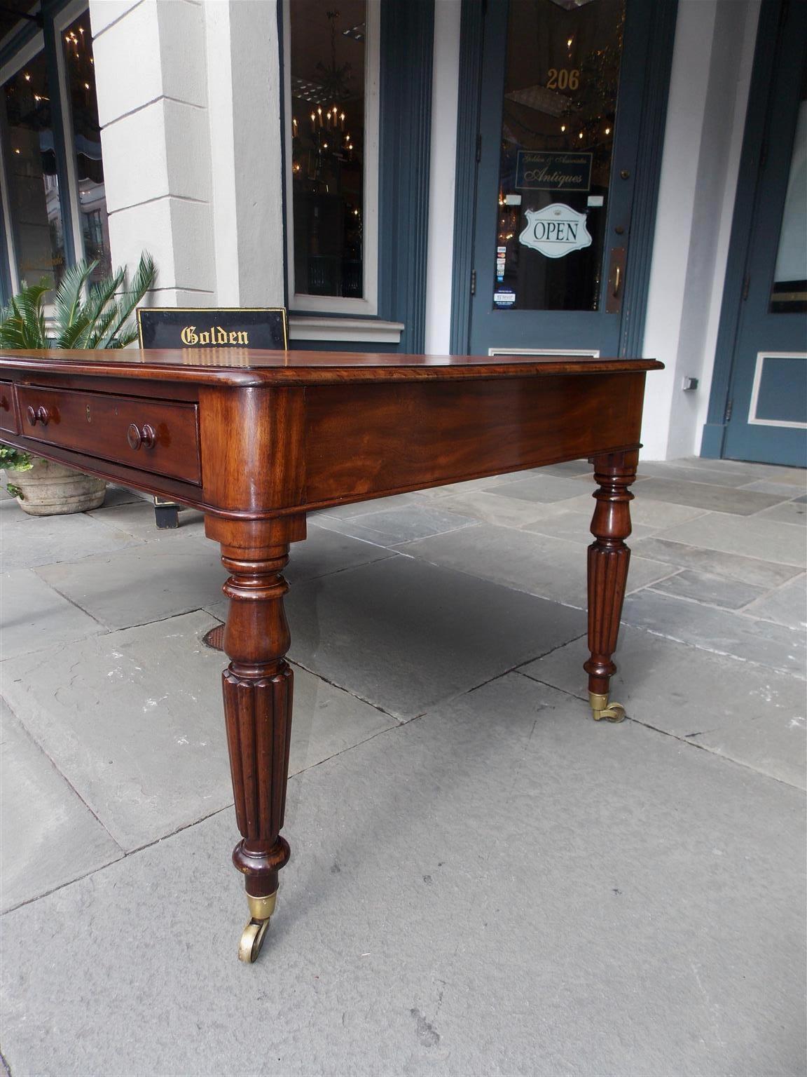 English Mahogany Leather Top Four-Drawer Partners Desk on Casters, Circa 1820 1