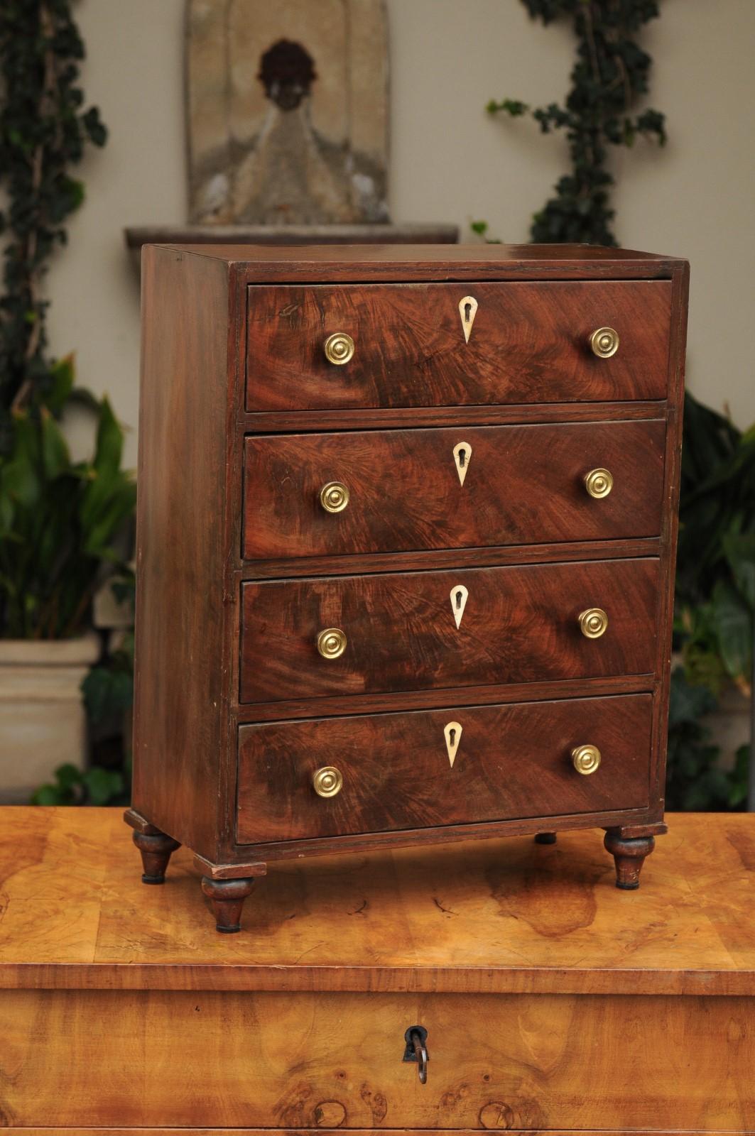 19th Century English Mahogany Mini Chest with Four Drawers and Toupie Feet, circa 1850