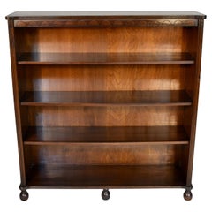 Antique English Mahogany Open Bookcase with Cannonball Feet