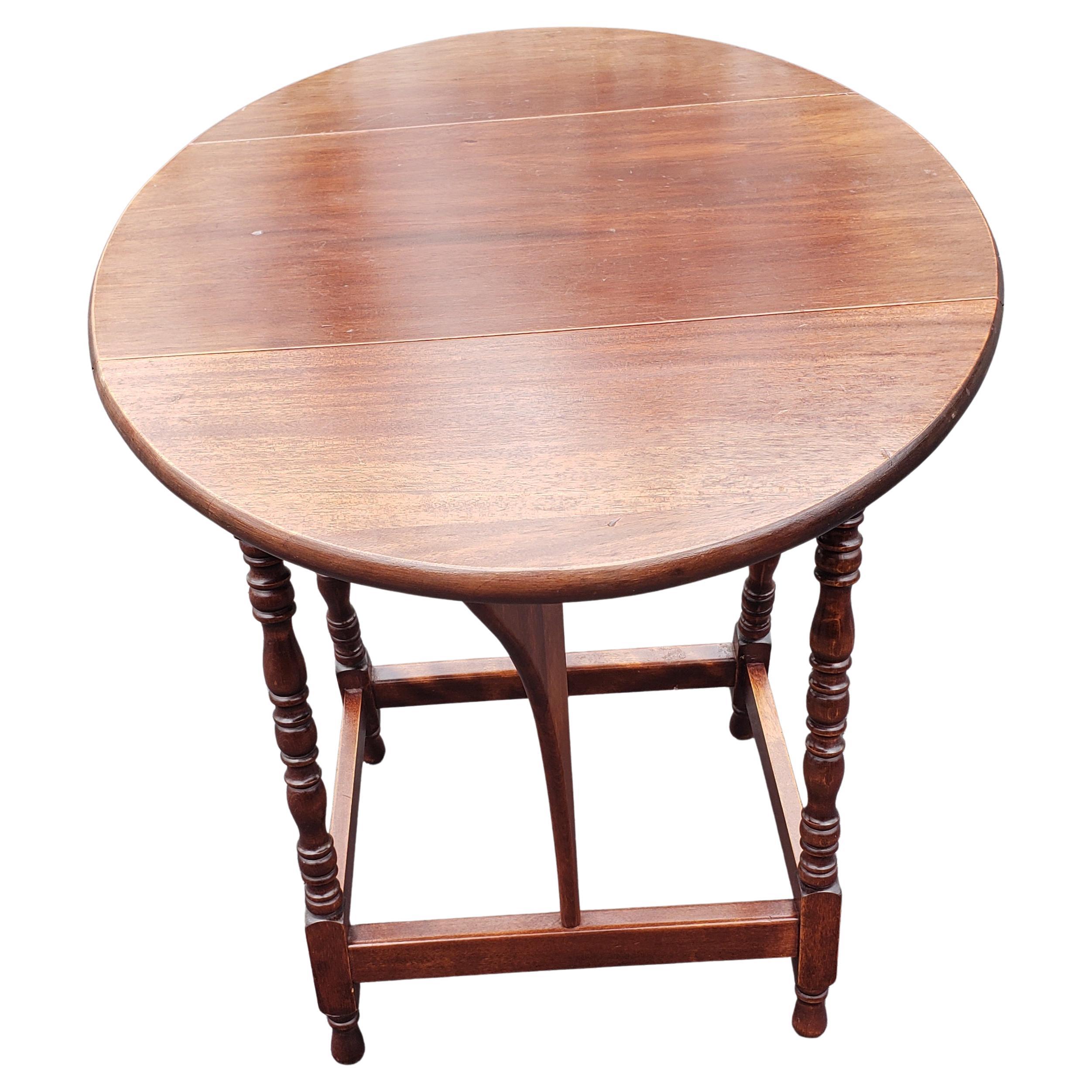 vintage round drop leaf table