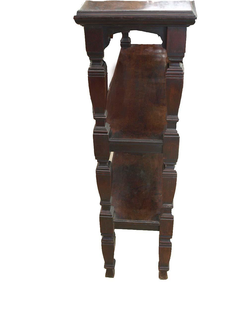 English mahogany three tier shelf is free standing ( back is the same as the front) so it could be used in the center of a room, also its narrow depth makes it ideal as a buffet in a small dining room or a display piece in a hall way. The four