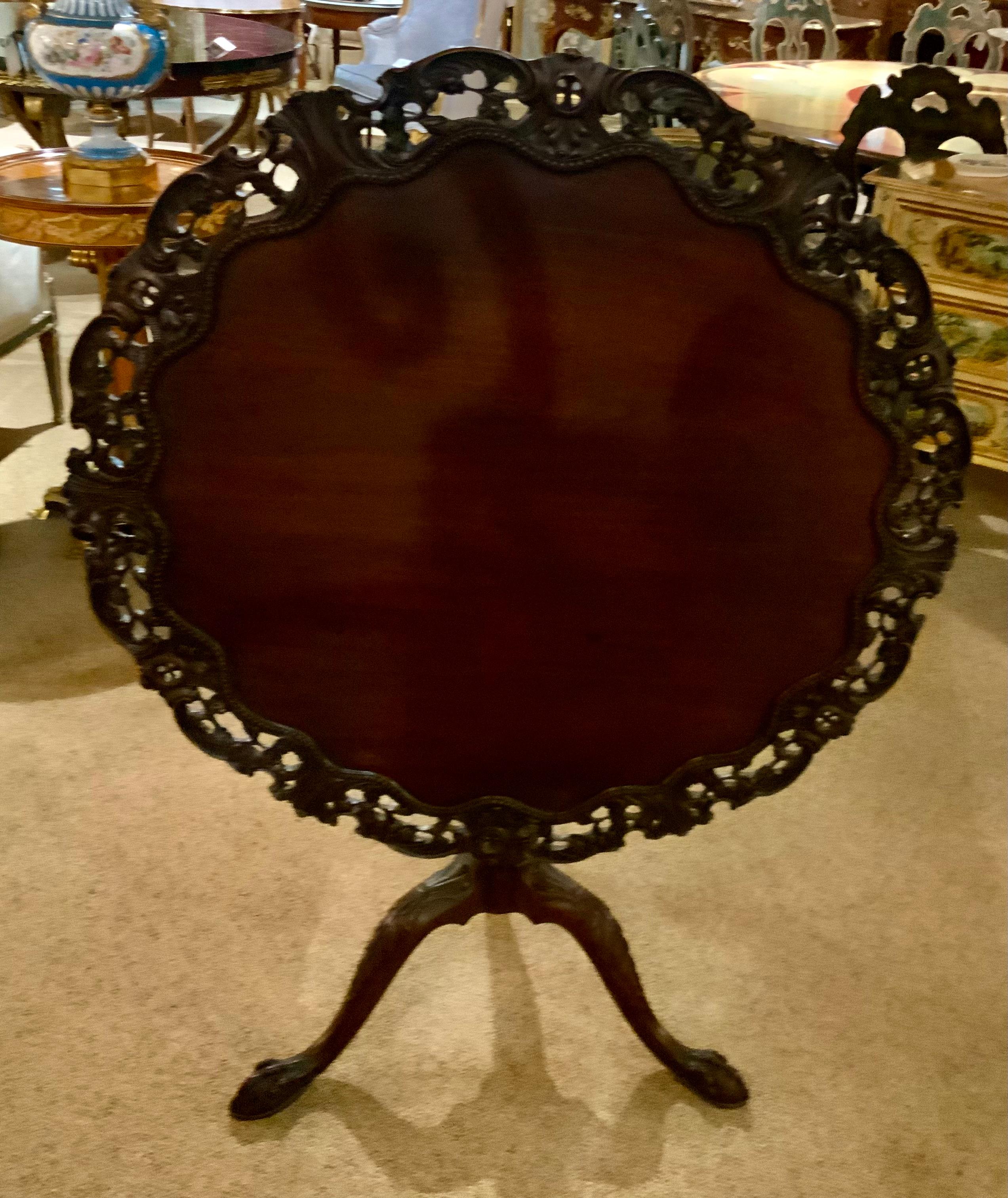 English mahogany tilt top table with finely carved edge, 19 th c. 2