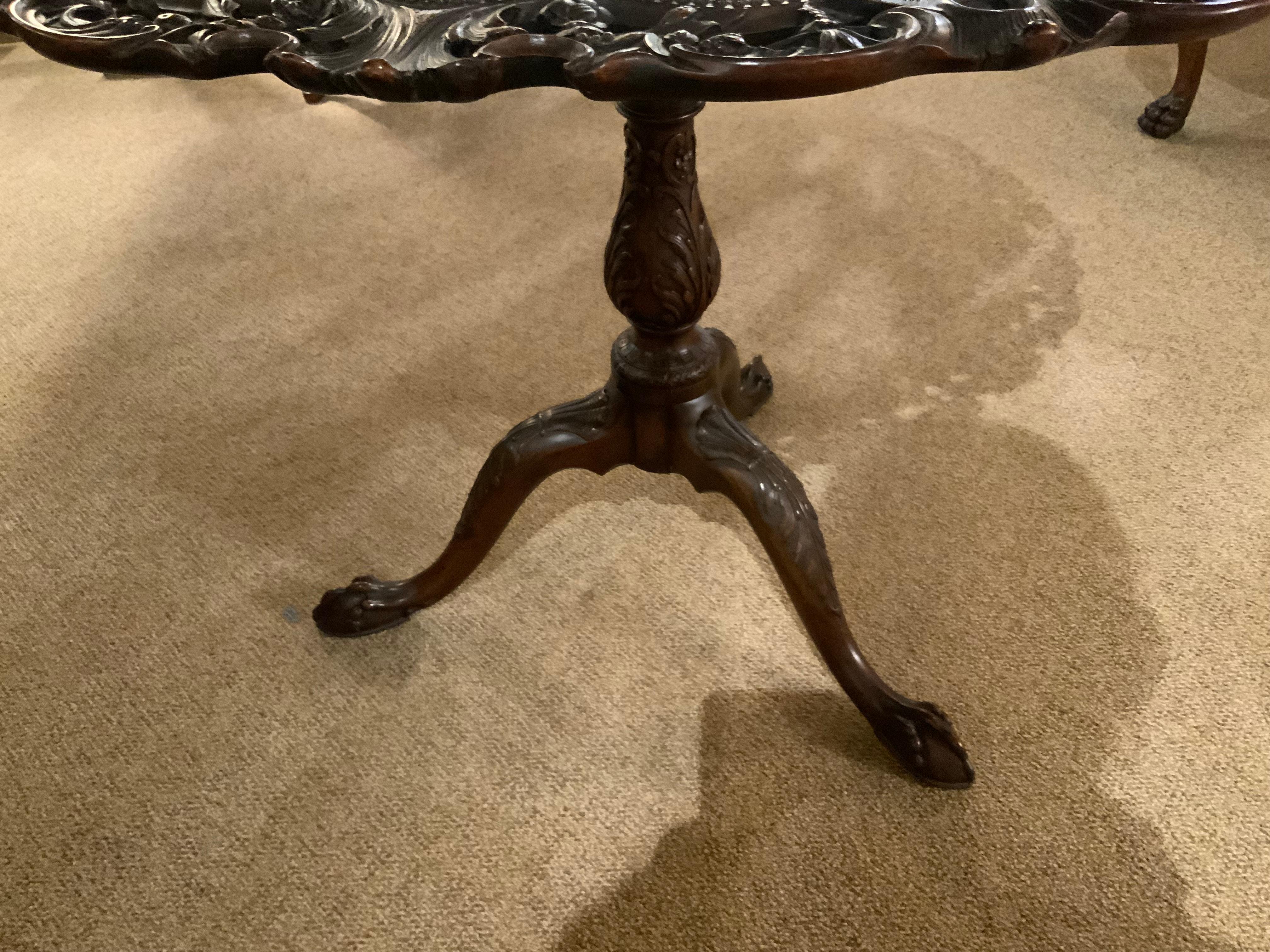 English mahogany tilt top table with finely carved edge, 19 th c. 1