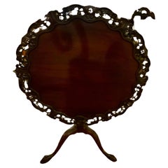 English mahogany tilt top table with finely carved edge, 19 th c.
