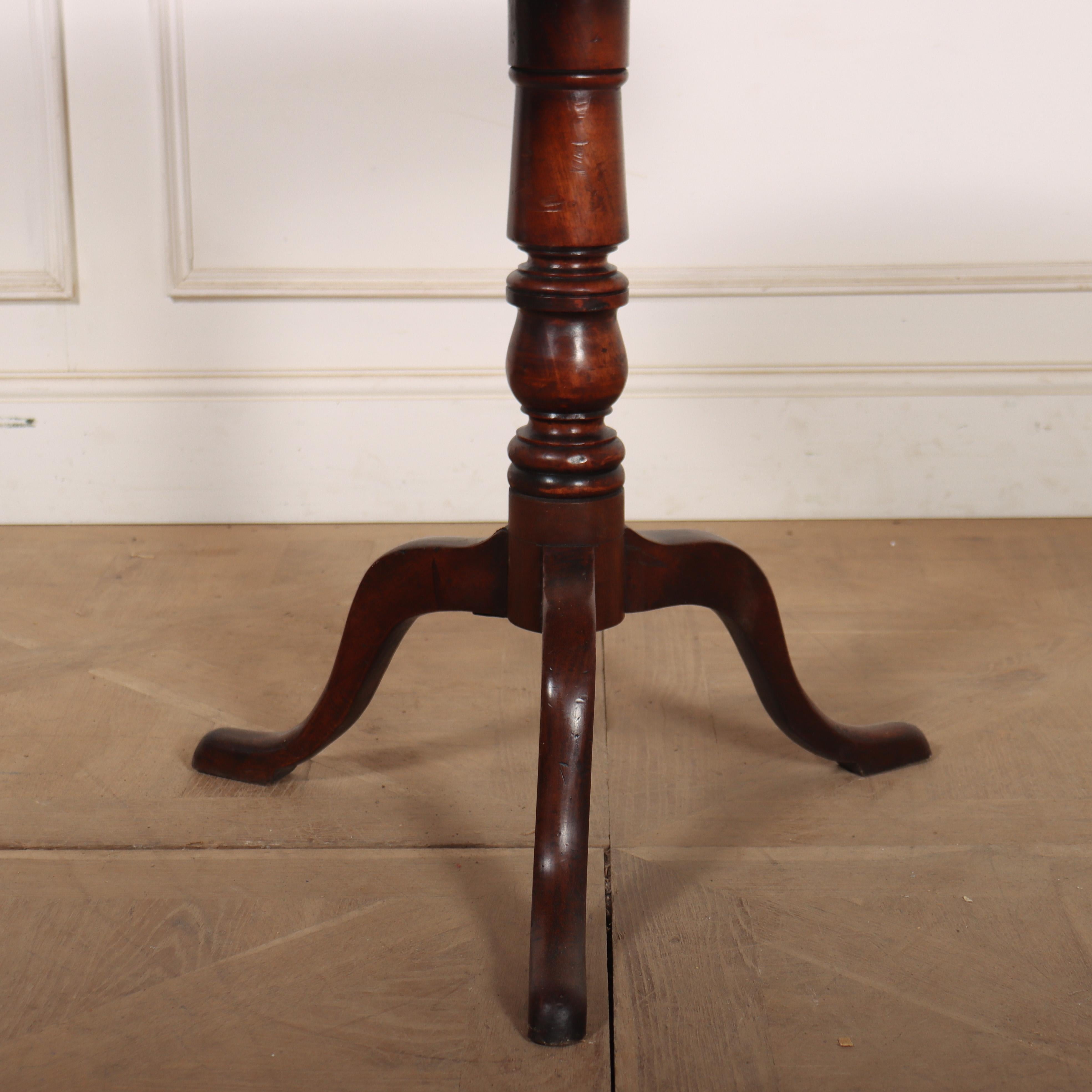Unusual 18th century English mahogany tripod table with a drop leaf and good colour. 1790. 

Code: 9206

Dimensions:
H: 27.5