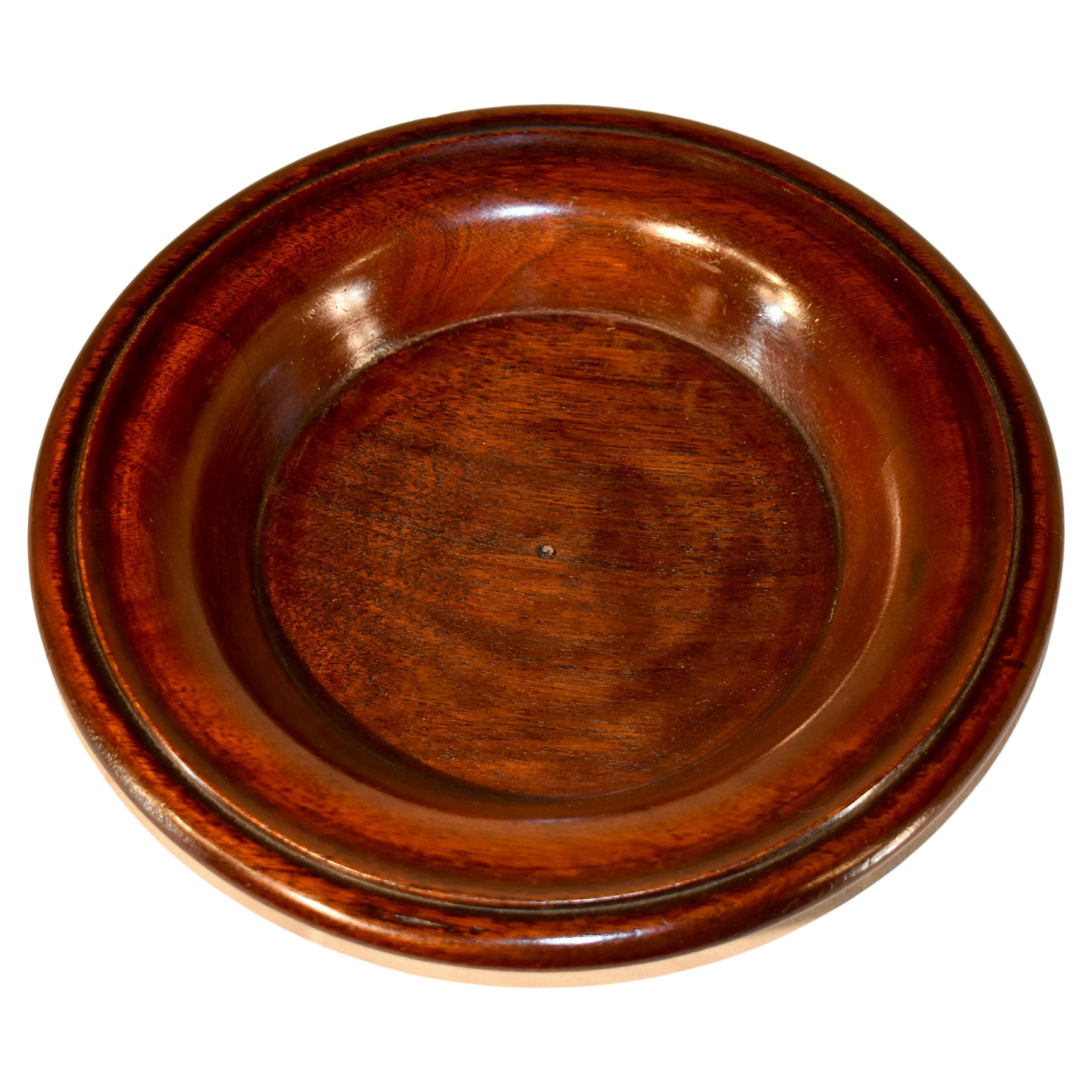 Edwardian oak hand turned bowl, c. 1900 from England.  It is made from lovely figured wood and has a gorgeous patina.  Very useful for anywhere in a house!