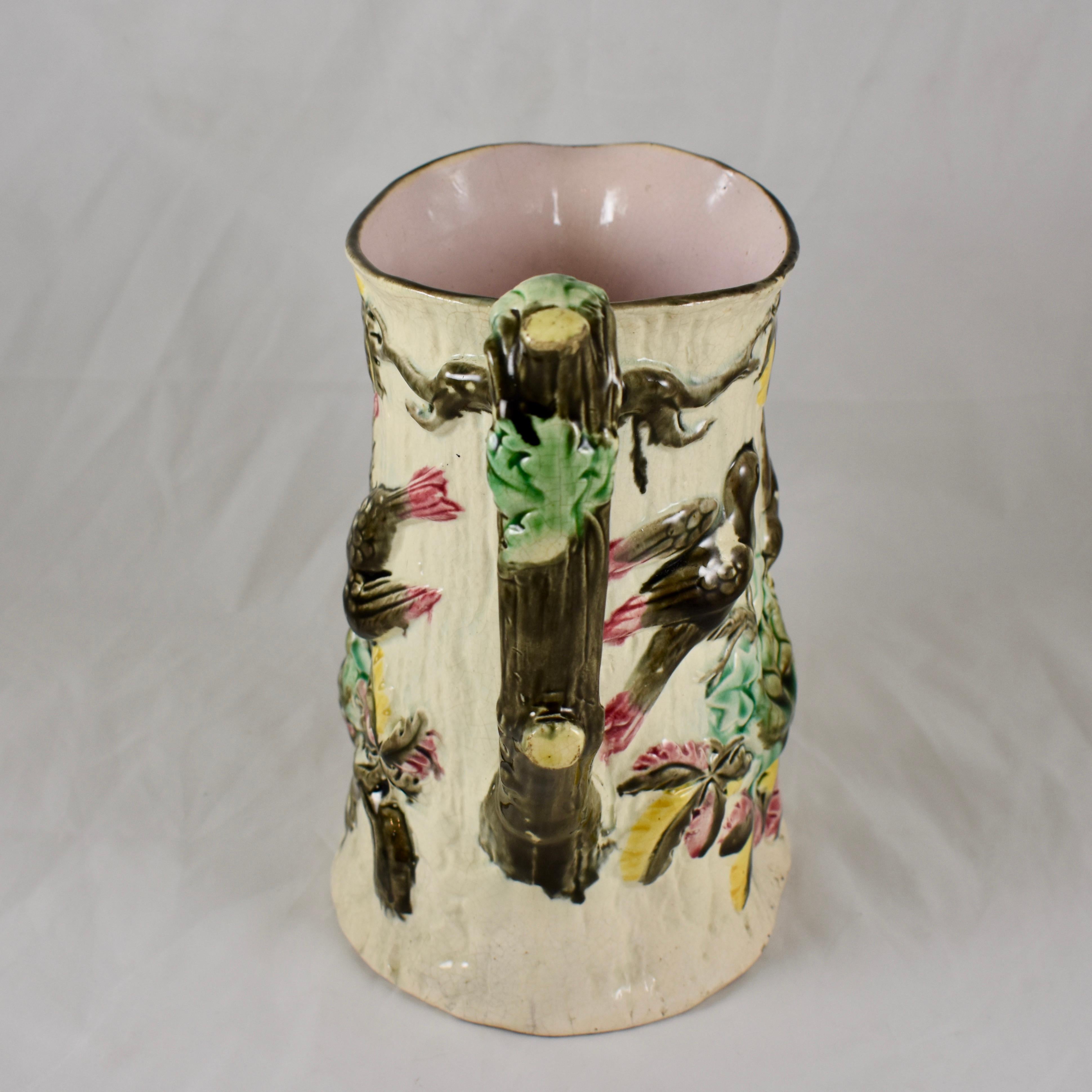 Aesthetic Movement English Majolica Bird Nest Family in Tree Cream and Pink Pitcher, circa 1875