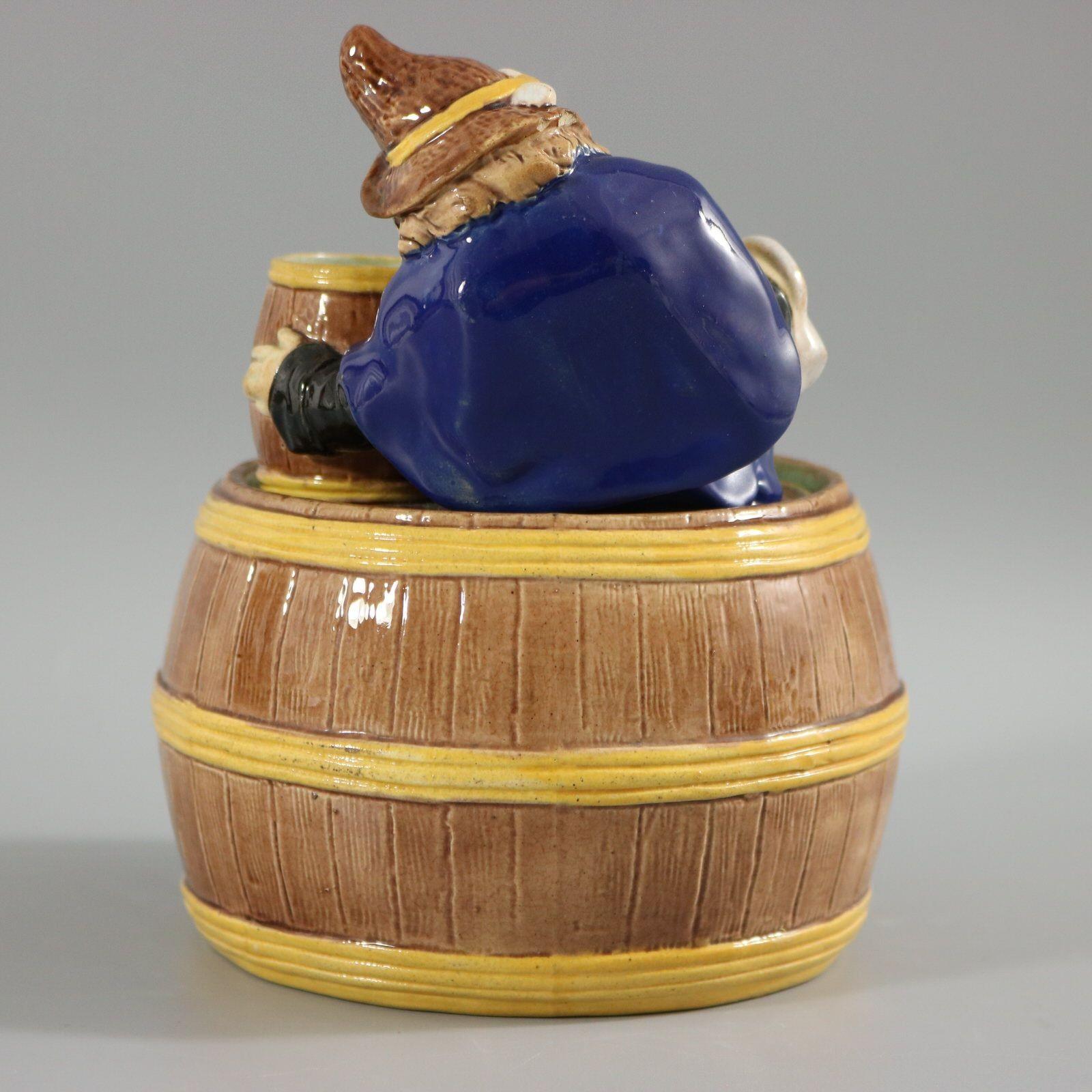 Late 19th Century English Majolica Dwarf on Barrel Jar And Cover For Sale