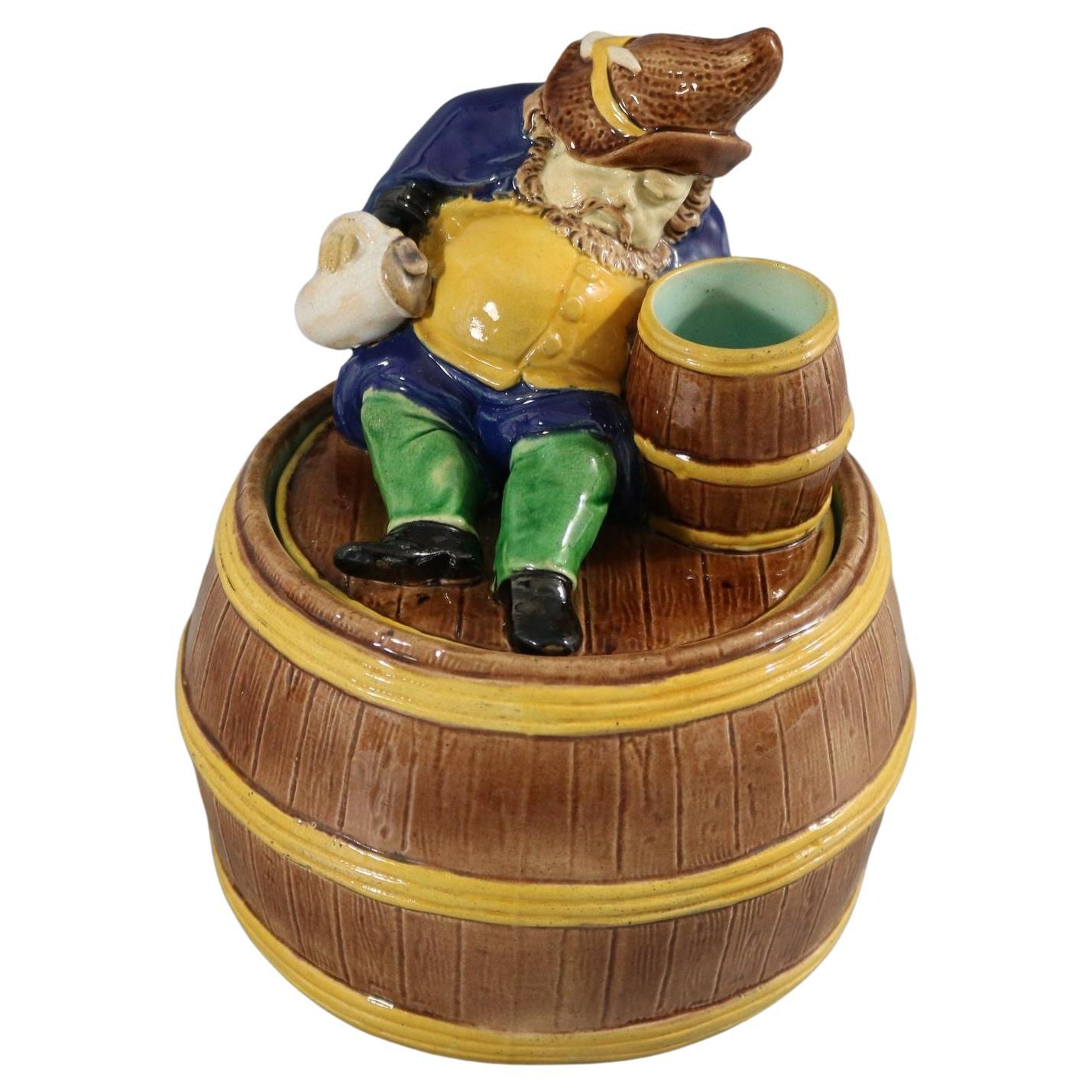 English Majolica Dwarf on Barrel Jar And Cover For Sale