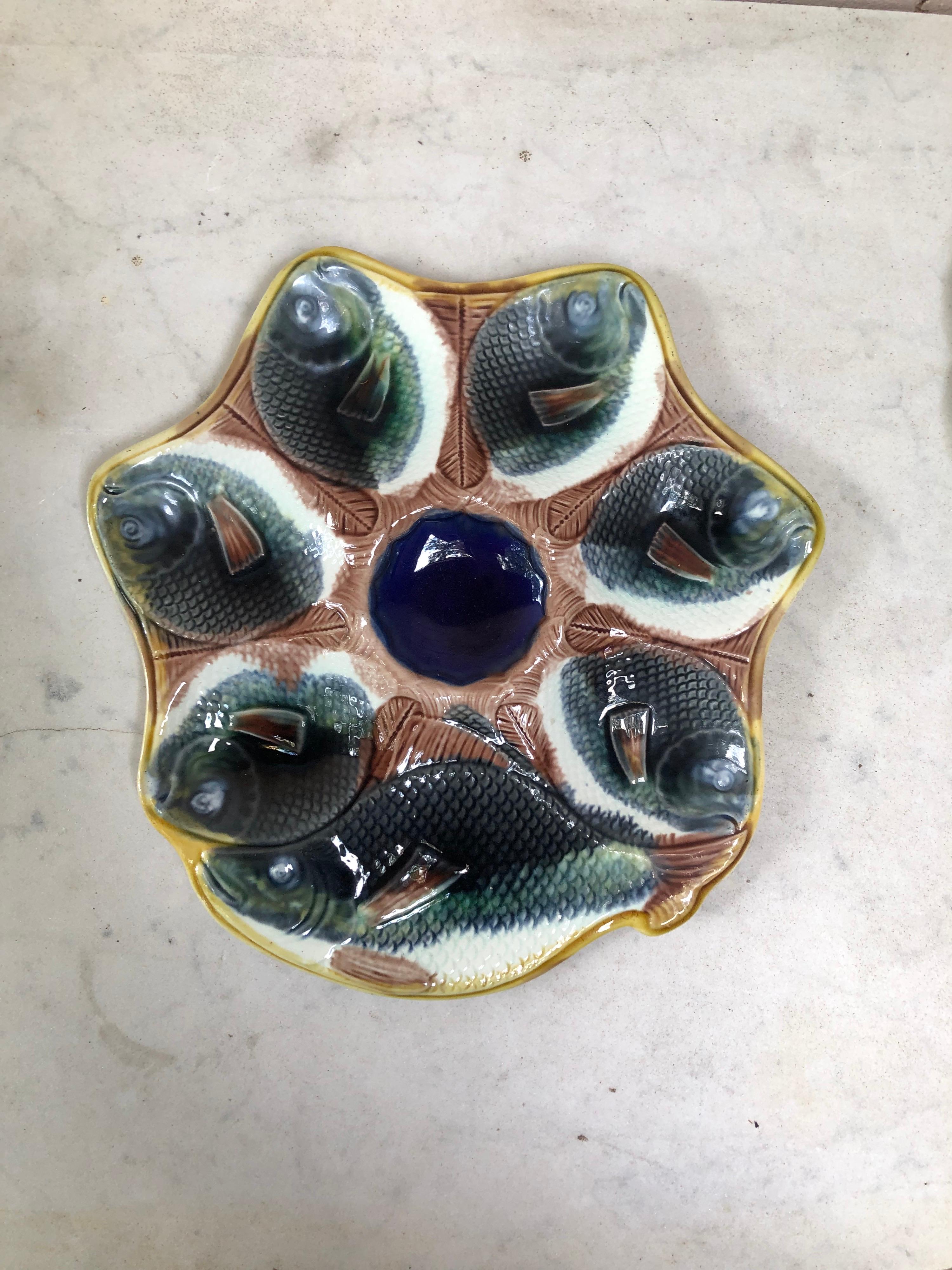 English Majolica fish heads oyster plate, circa 1890.