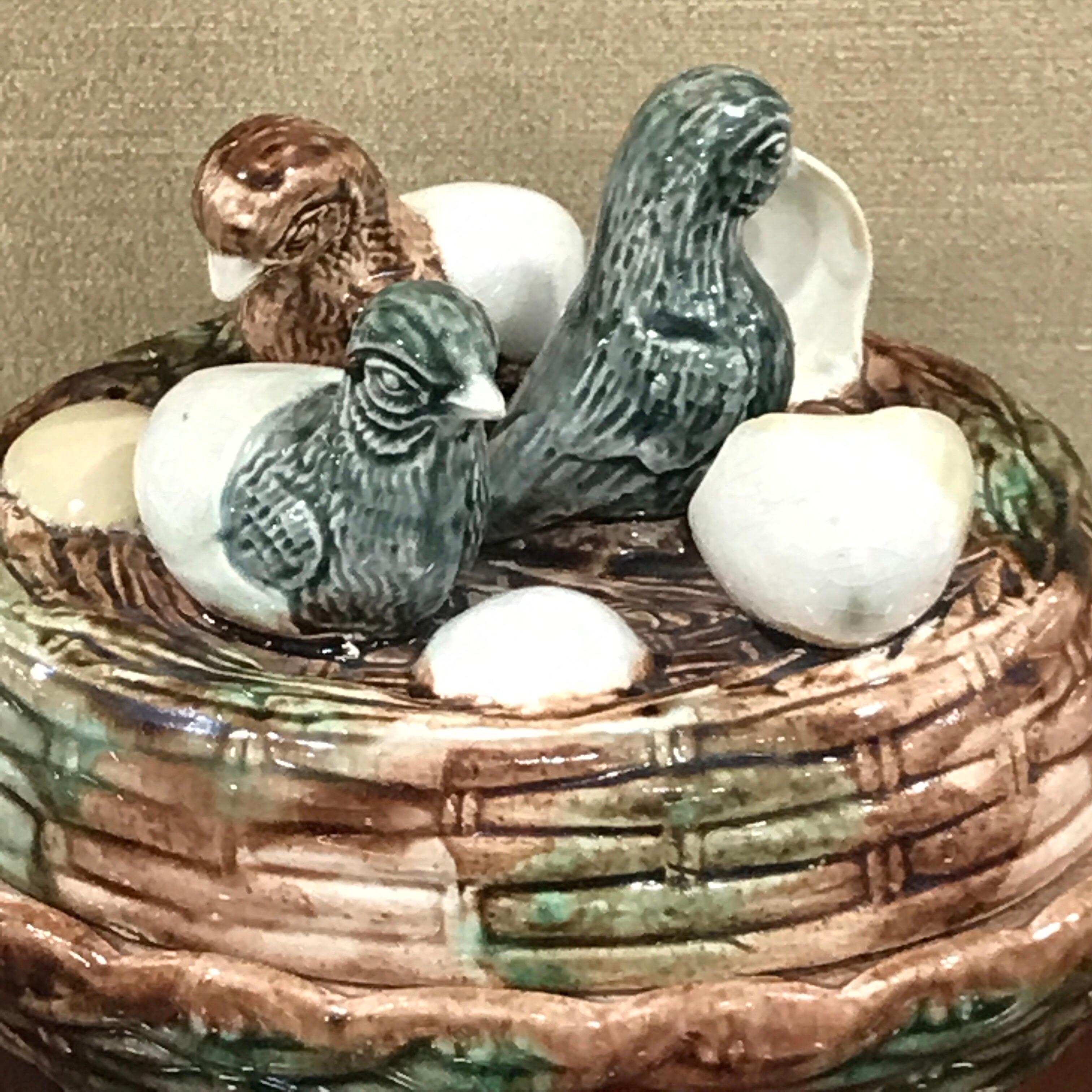 English Majolica game dish, hatchling's on nest, with three hatchling chicks on a realistically modeled two-piece nest tureen.