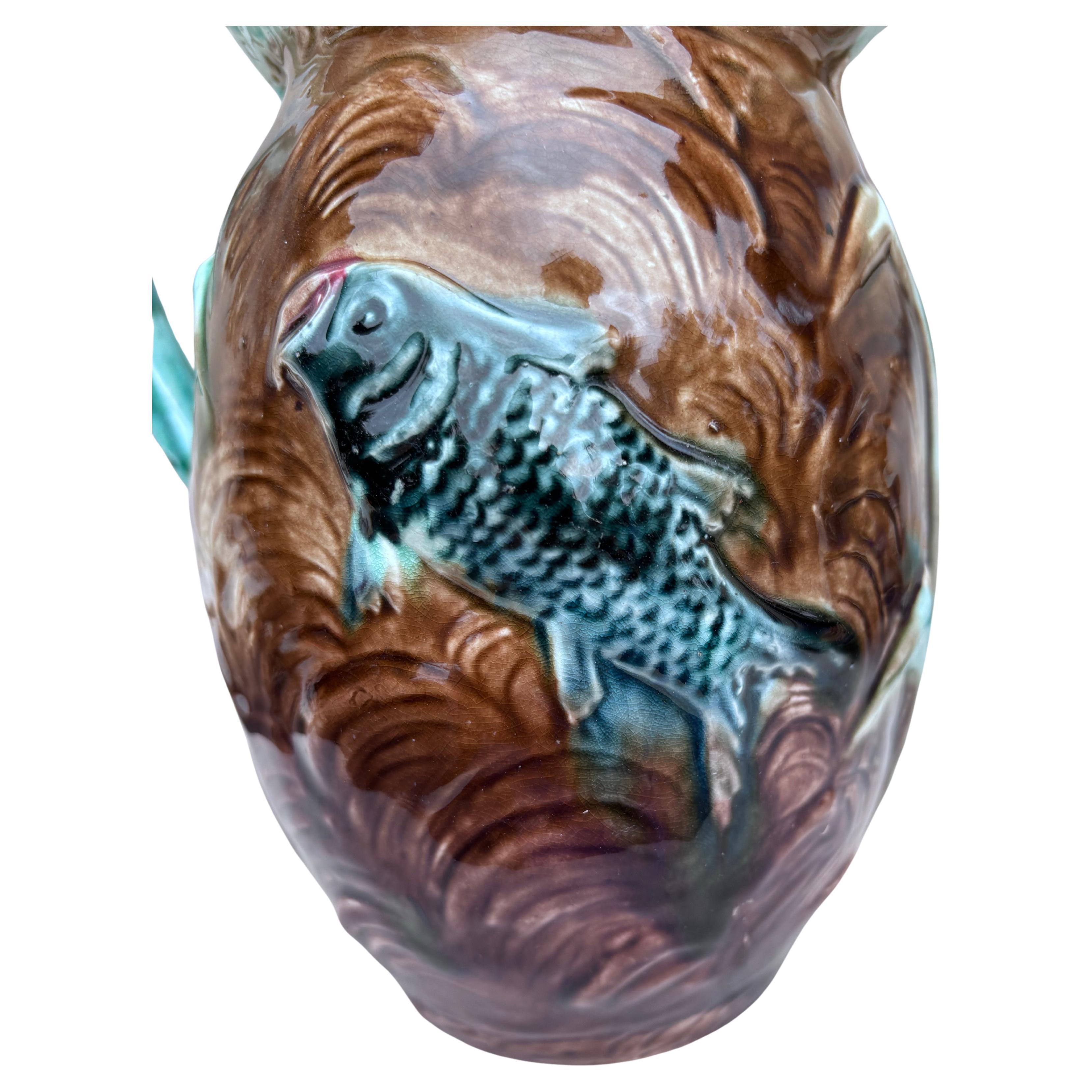 Unusual English Majolica Swan & Fishs Pitcher, circa 1890.
The handle of the pitcher is a swan and the pitcher is decorated with fishs
Height / 8.8 inches.