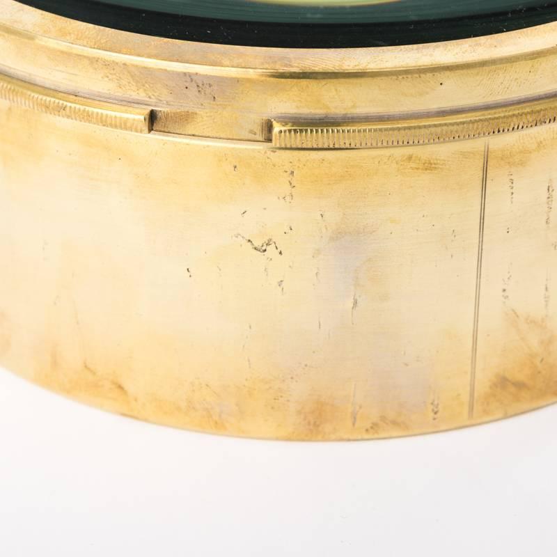 English map lens with a brass frame, circa early 20th century.
 