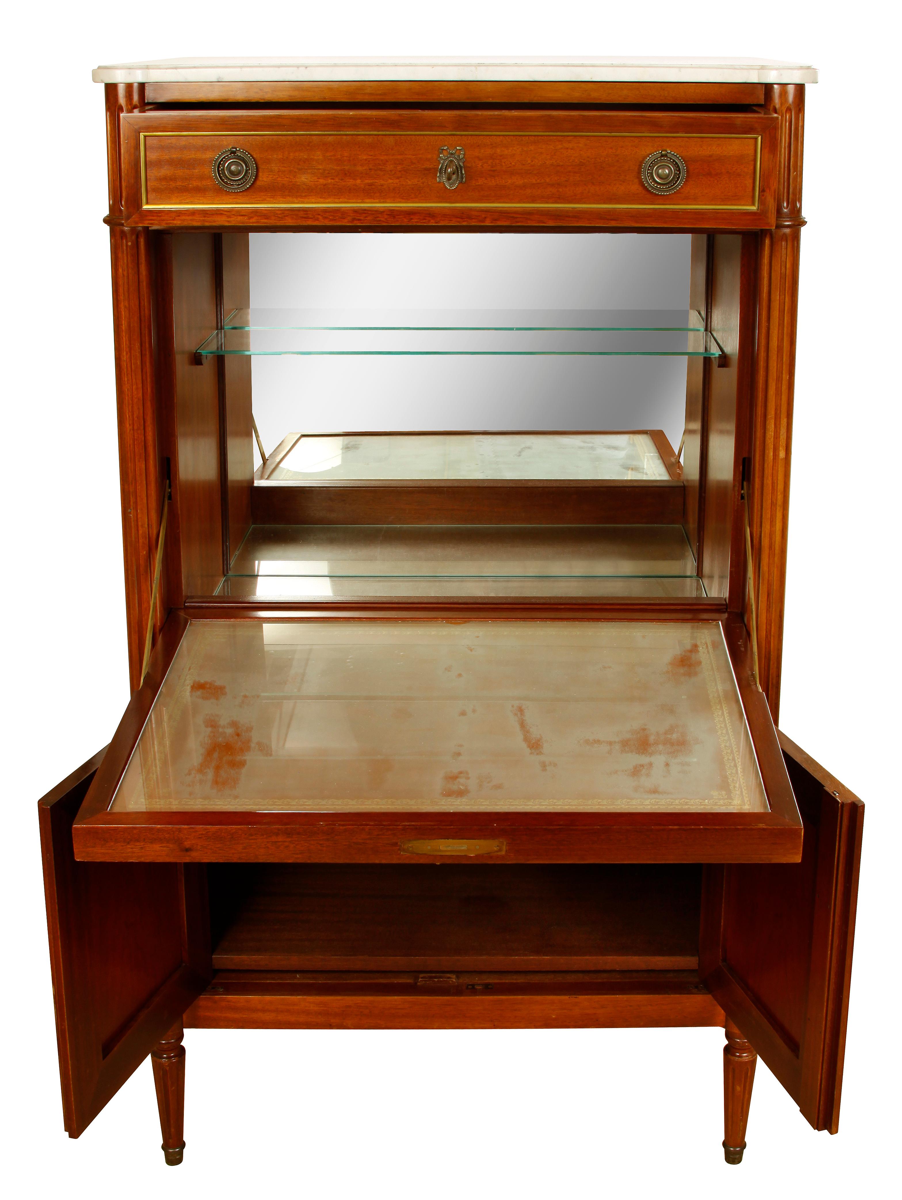 Louis XVI style marble top semanier with brass fittings. One drawer at top, door on hinges opens to mirrored back and one shelf, and two doors open at bottom.