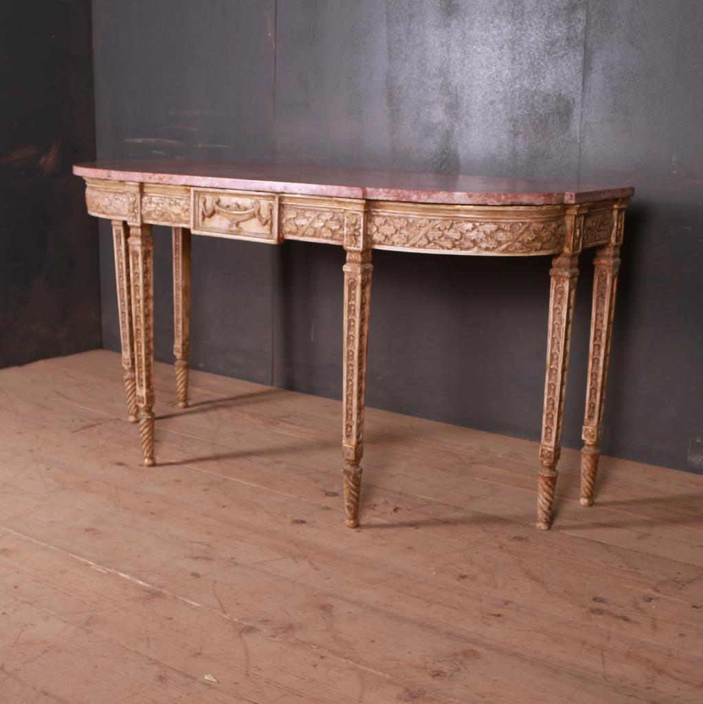 Good early 19th century carved wood marble-top console table, 1820.

Dimensions
66 inches (168 cms) wide
26.5 inches (67 cms) deep
34.5 inches (88 cms) high.