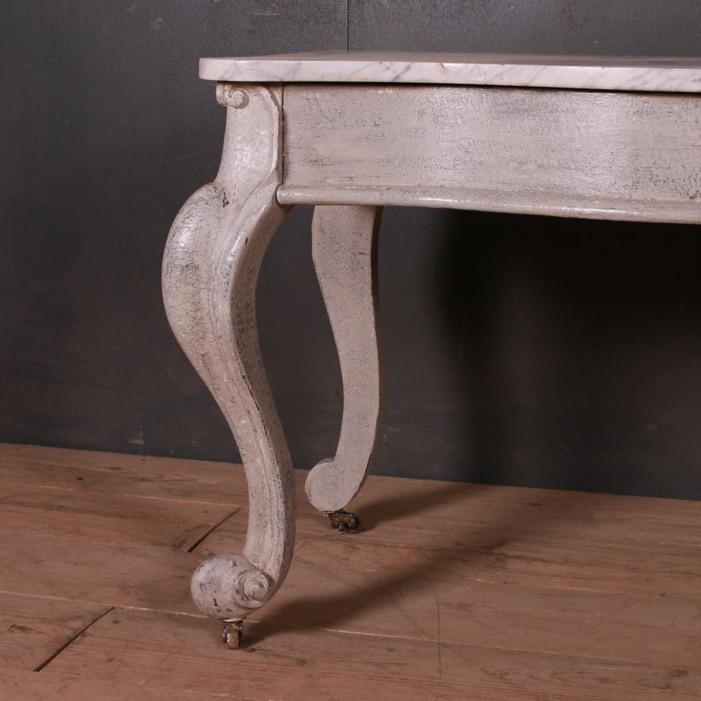 Small one drawer marble topped painted console table/ lamp table, 1880.

Dimensions
48 inches (122 cms) wide
21 inches (53 cms) deep
28 inches (71 cms) high.