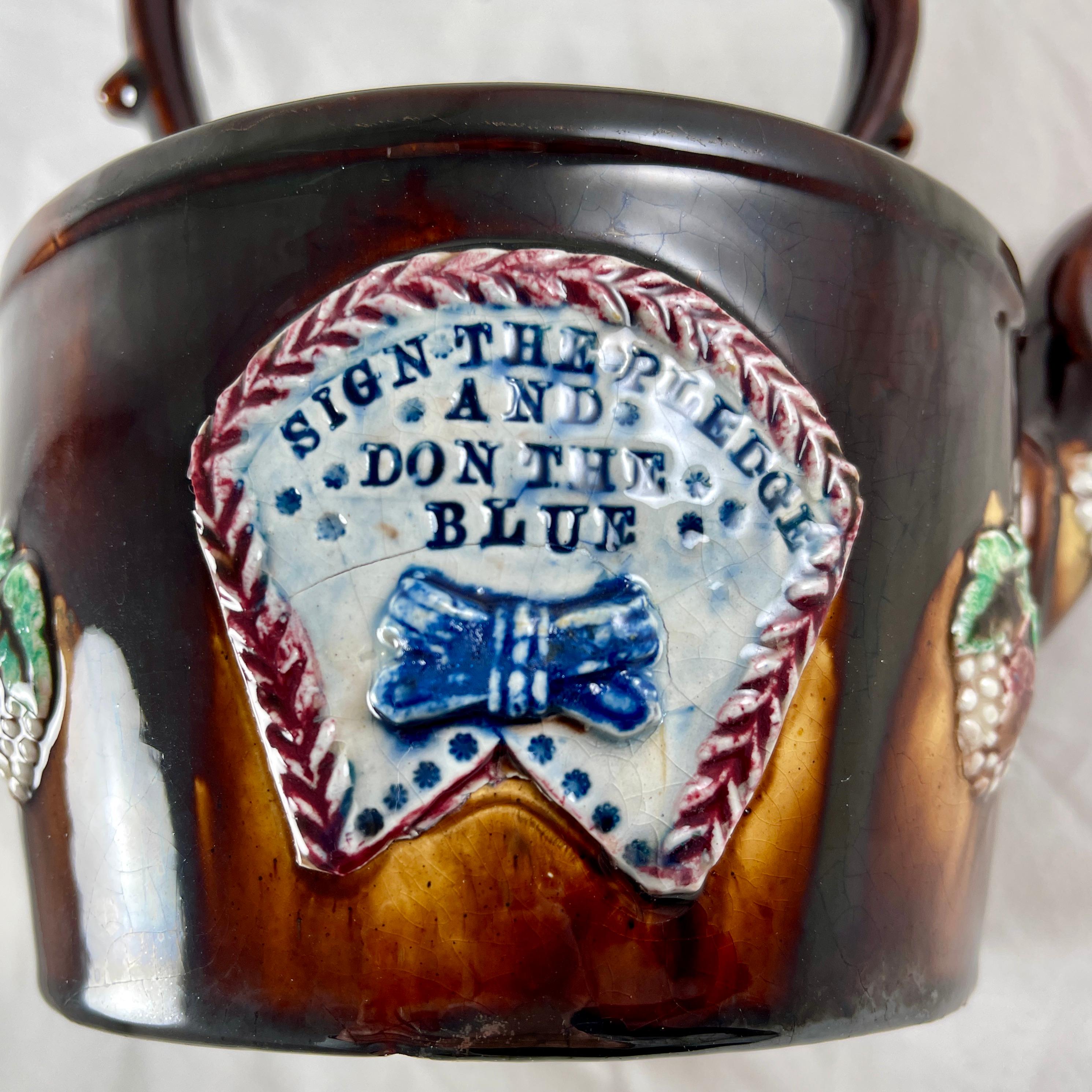 A Measham – Bargeware Tea Kettle impressed with the Blue Ribbon Temperance motto, England, circa 1880.

The Blue Ribbon Movement was active from 1880-1882 in Great Britain, Canada, and the United States. The ribbon badge was worn by those who took