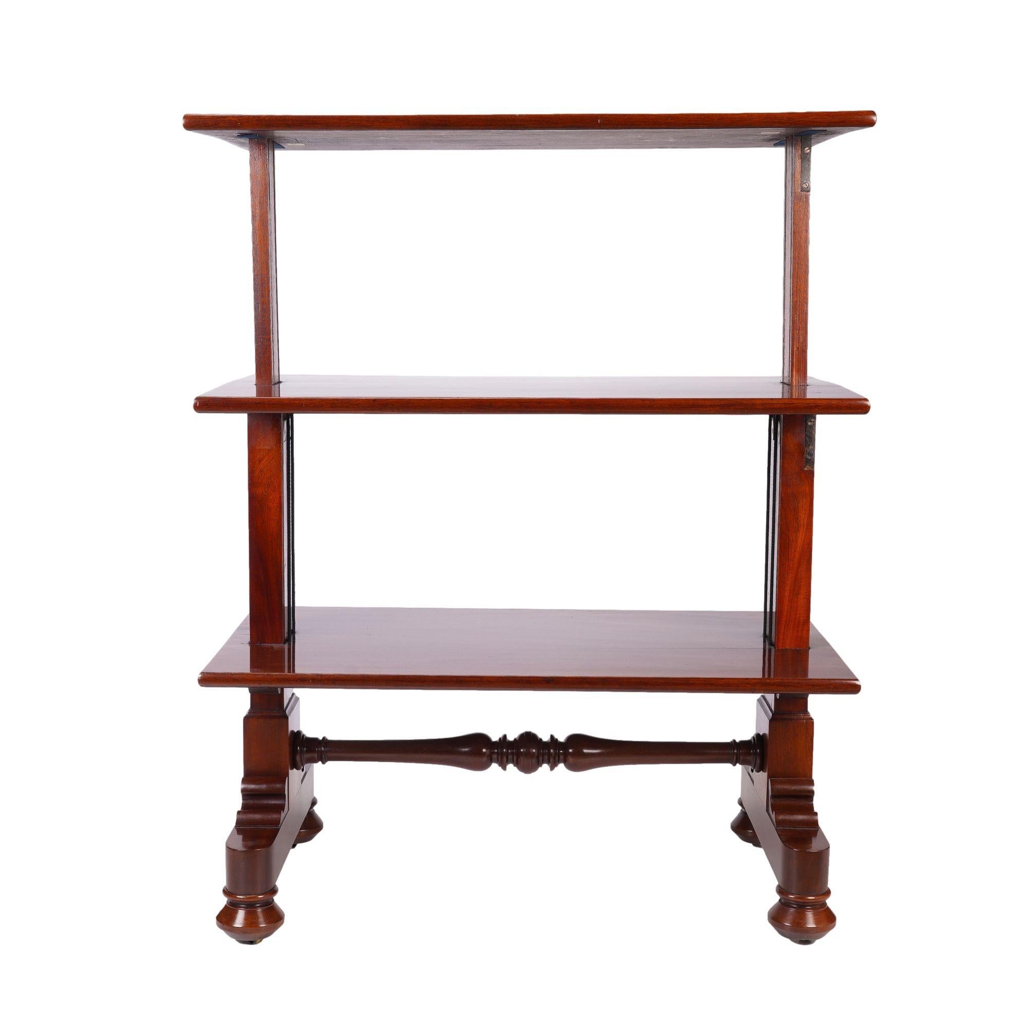 Mahogany metamorphic dumbwaiter with three rectangular single board bullnose shelves which telescope by 13-1/4